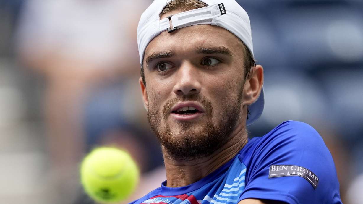 Tomas Machac, of the Czech Republic, returns a shot to Sebastian Korda, of the United States during the second round of the U.S. Open tennis championships, Thursday, Aug. 29, 2024, in New York.