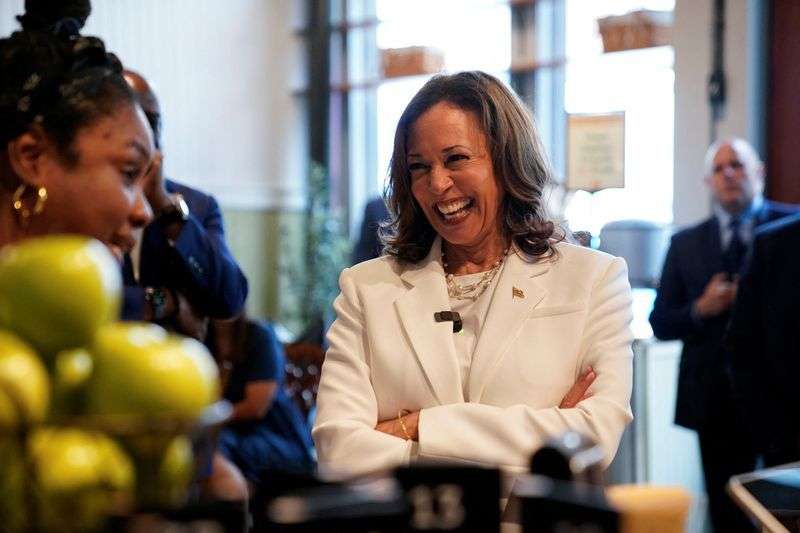 Democratic presidential nominee and Vice President Kamala Harris reacts as she visits Dottie's Market in Savannah, Ga., Thursday.
