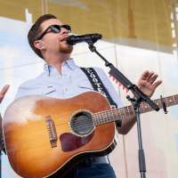 Scotty McCreery halted his concert after man in the audience allegedly assaulted a woman