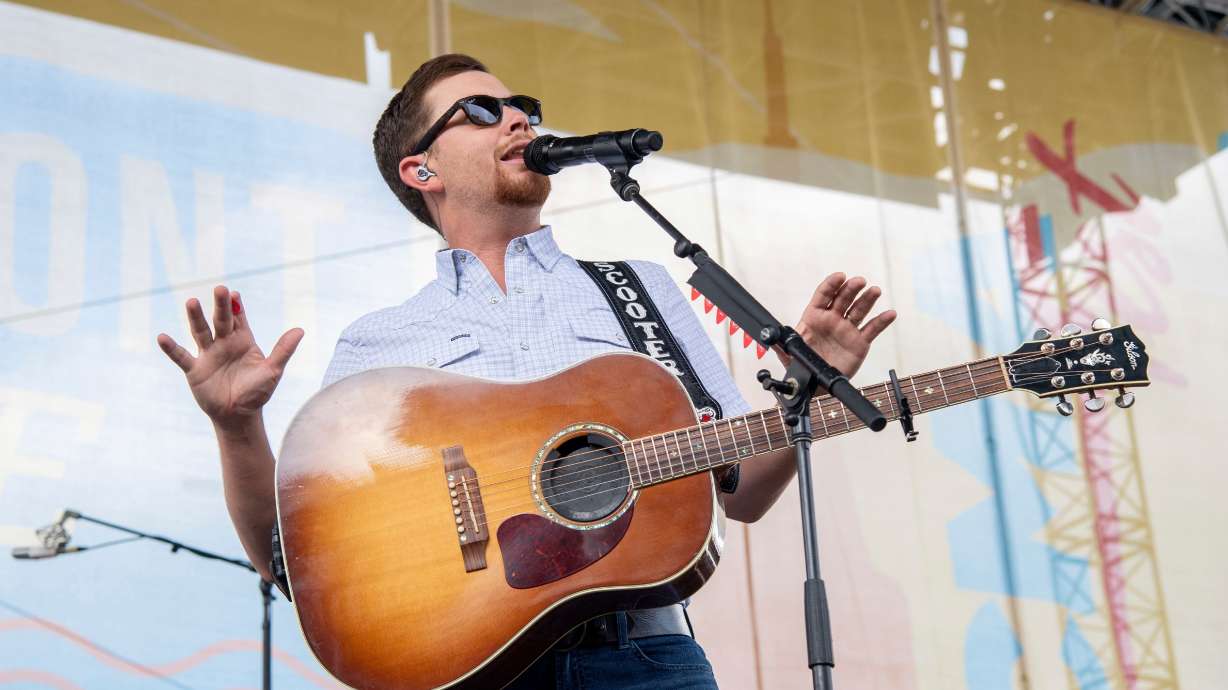 Scotty McCreery performs during CMA Fest 2022 on June 12, 2022, at the Chevy Riverfront Stage in Nashville, Tenn. A man allegedly struck a woman in the audience at a recent McCreery concert.