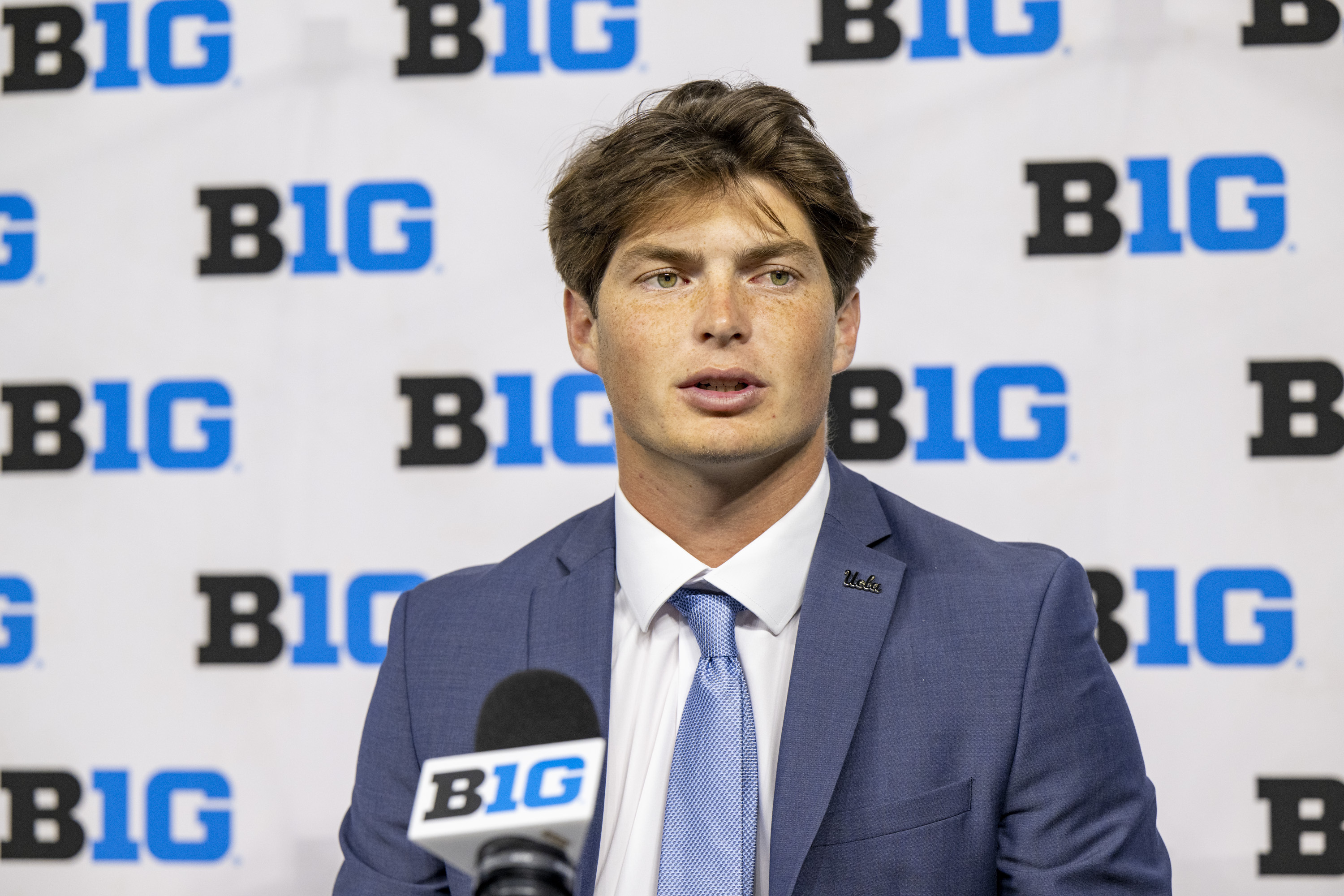 FILE - UCLA's Ethan Garbers talks with reporters during an NCAA college football news conference at the Big Ten Conference media days at Lucas Oil Stadium, July 24, 2024, in Indianapolis. 