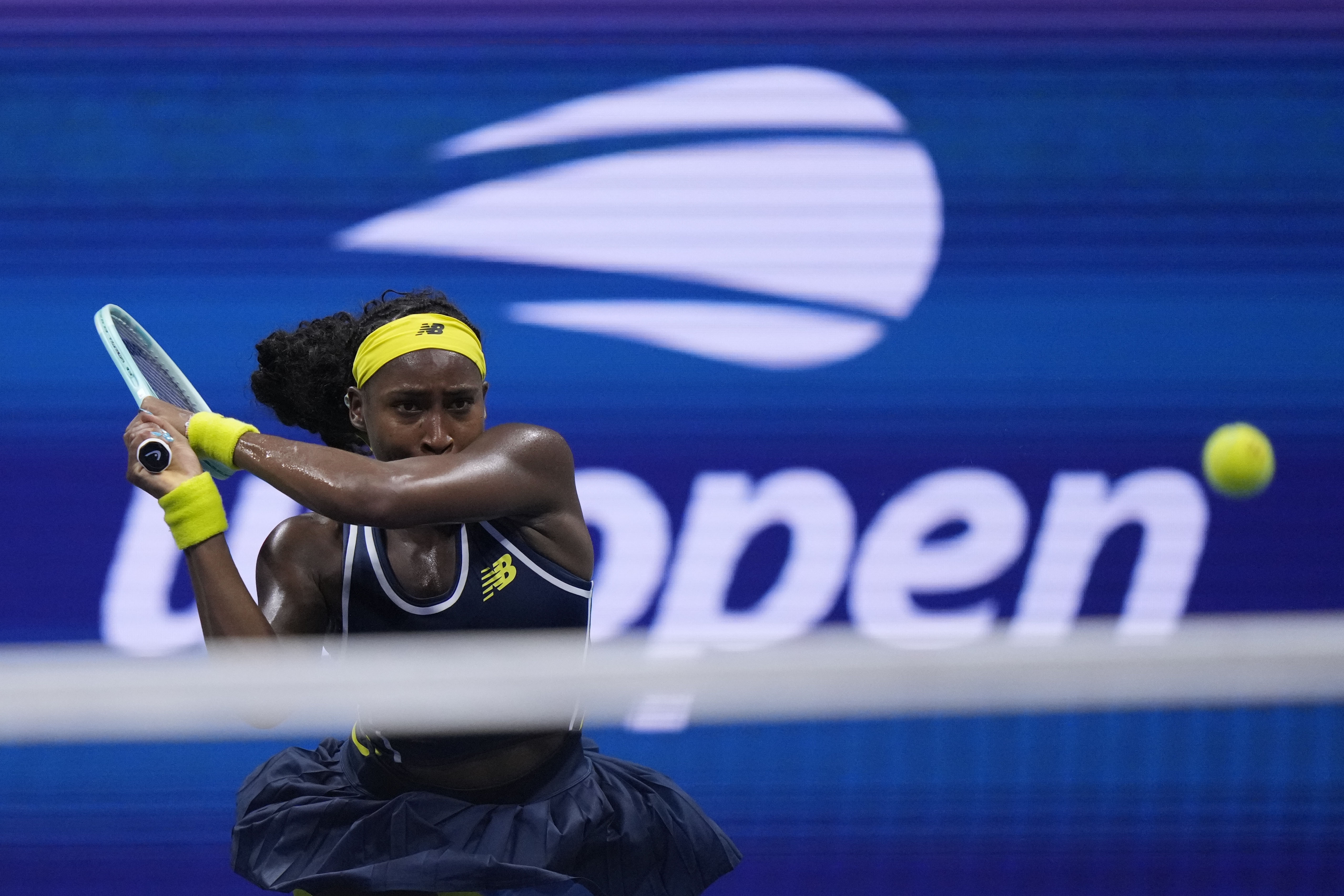 Coco Gauff, of the United States, returns a shot to Tatjana Maria, of Germany, during a second round match of the U.S. Open tennis championships, Wednesday, Aug. 28, 2024, in New York.