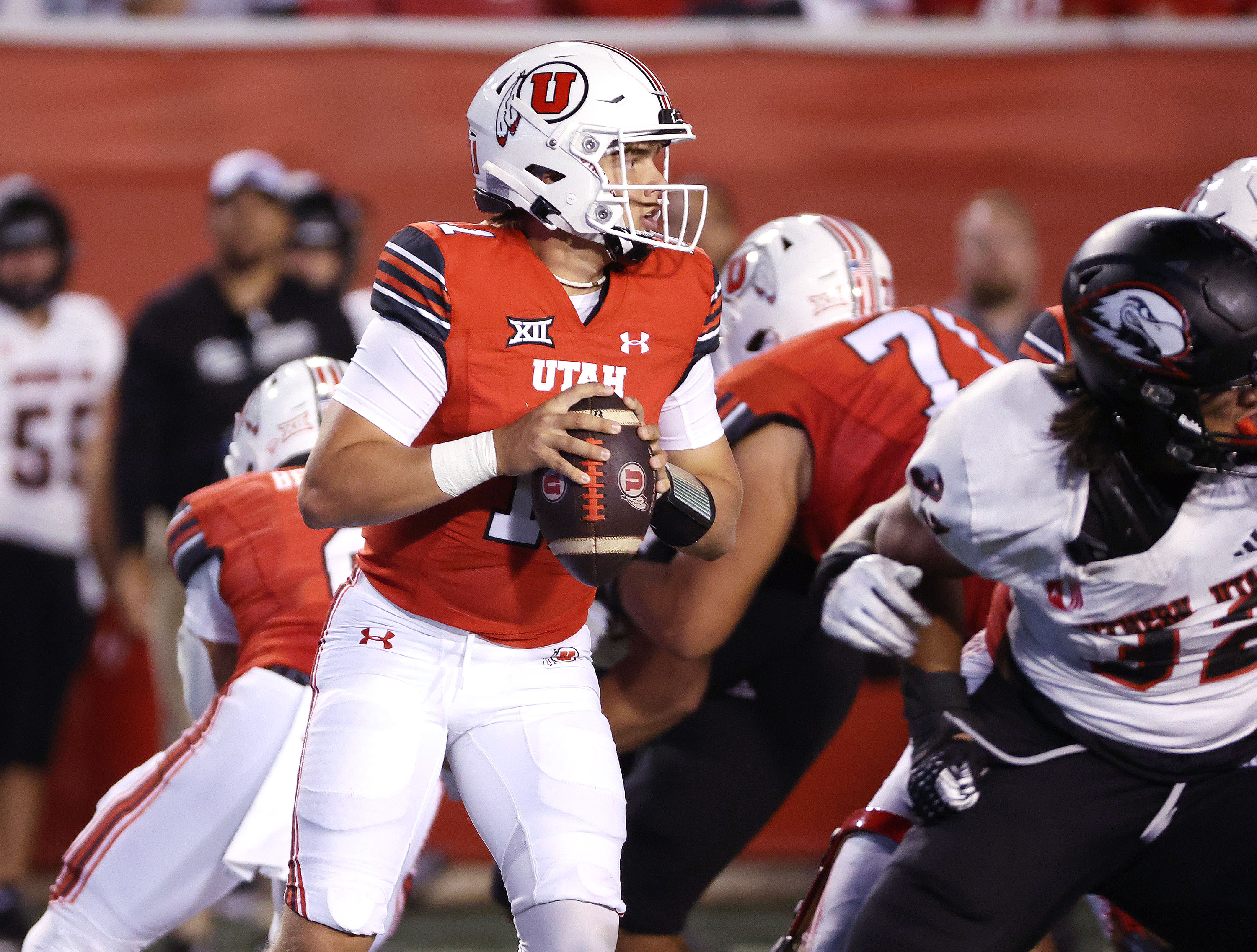 Utah Utes quarterback Isaac Wilson (11) throws an interception against SUU during the home opener in Salt Lake City on Thursday, Aug. 29, 2024.