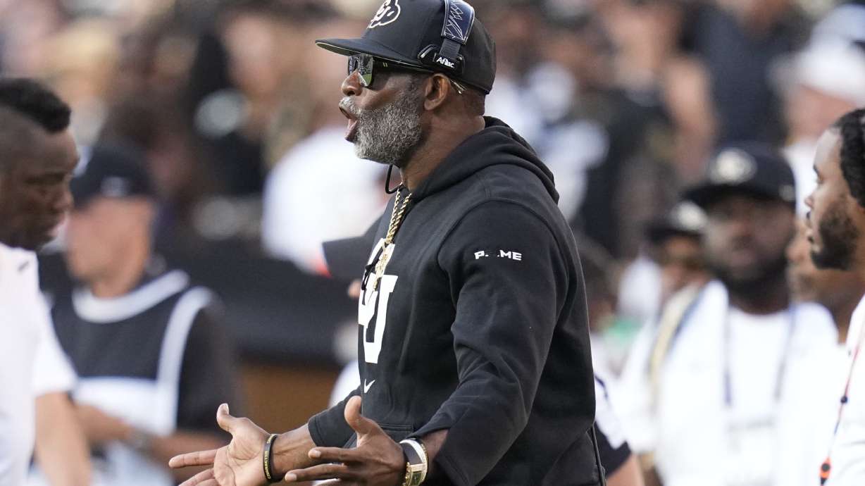 Colorado head coach Deion Sanders reacts during the first half of an NCAA college football game against North Dakota State, Thursday, Aug. 29, in Boulder, Colo.