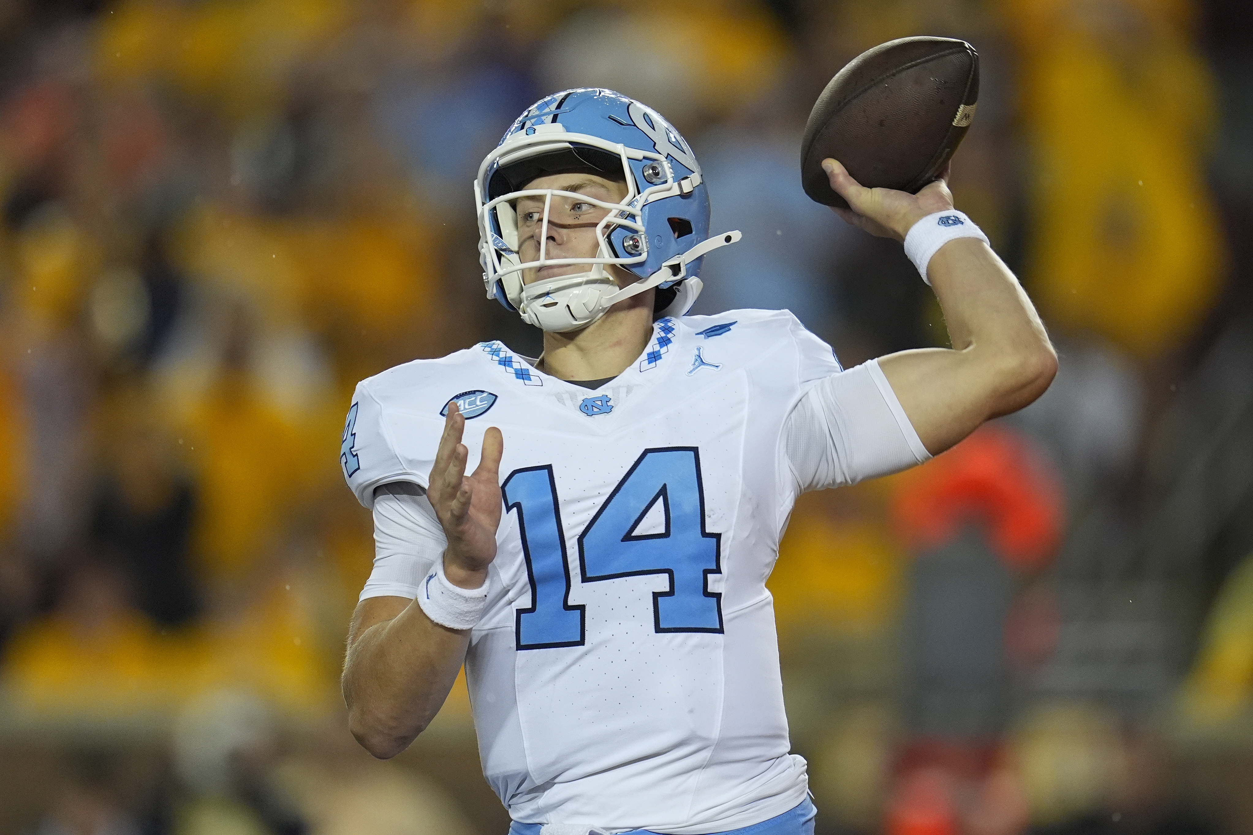 North Carolina quarterback Max Johnson (14) passes during the first half of an NCAA college football game against Minnesota, Thursday, Aug. 29, 2024, in Minneapolis. 