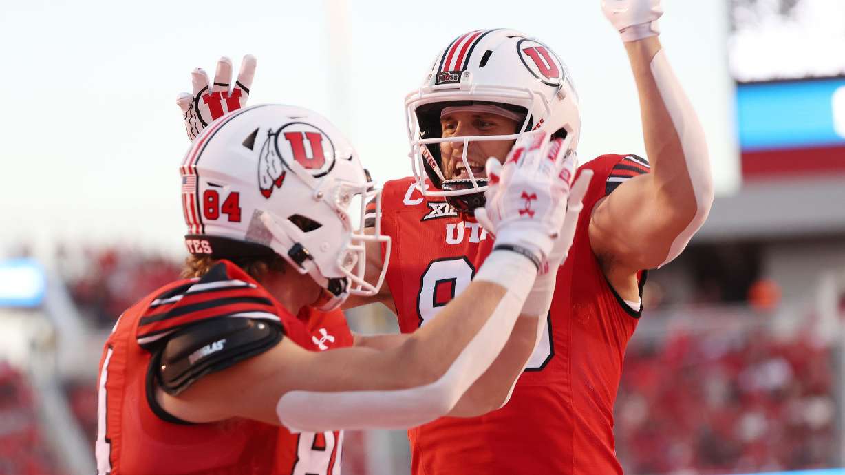 Utah Utes tight end Brant Kuithe (80) celebrates his touchdown with Utah Utes tight end Caleb Lohner (84) against SUU in Salt Lake City on Thursday, Aug. 29, 2024. Utah won 49-0.