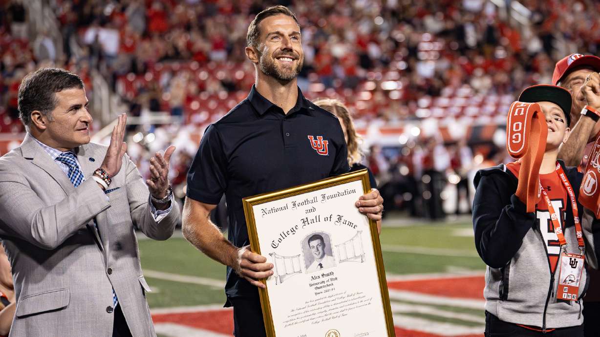 Former Utah QB Alex Smith is honored at halftime as the first member of the Utah football Ring of Honor on Aug. 29, 2024.