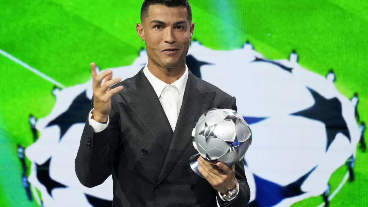 Cristiano Ronaldo, the all-time leading goalscorer in the Champions League, speaks after receiving a special award from UEFA President Aleksander Ceferin in recognition of his achievements in the competition, during the Champions League, league phase, draw, in Monaco, Thursday, Aug. 29, 2024.