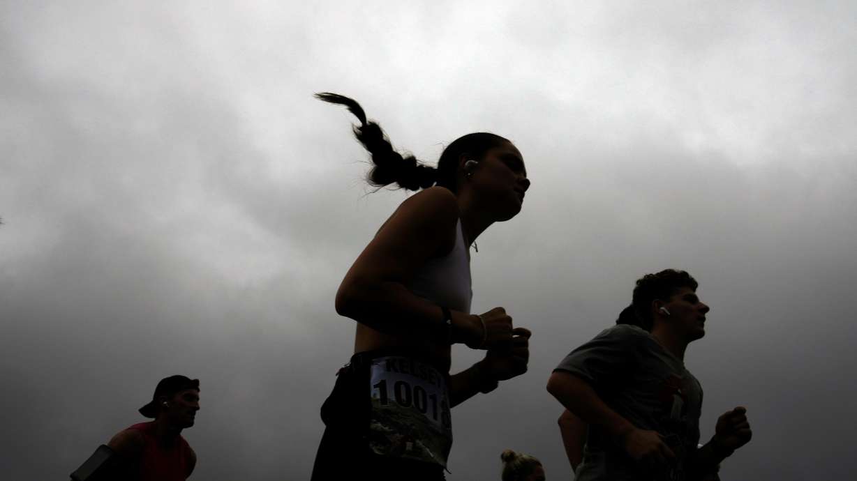 Runners compete in the Falmouth Road Race, Sunday, Aug. 18, 2024, in Falmouth, Mass.