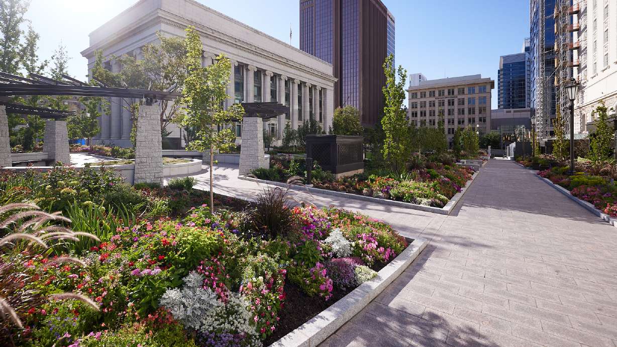 Flowers and trees within the renovated Church Office Building Plaza on Temple Square are pictured on Wednesday. The plaza reopened earlier this year.