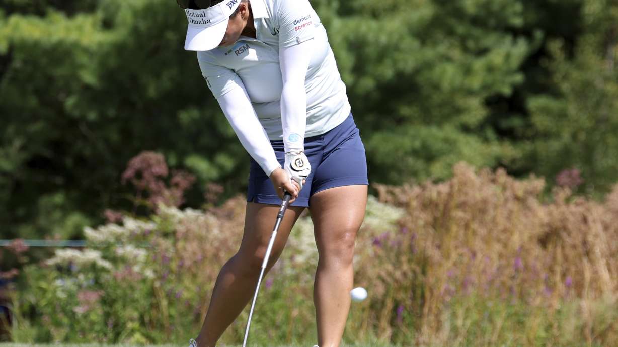 Megan Khang of the United States tees off on the 3rd during the first round of the FM championship LPGA golf tournament, Thursday, Aug. 29, 2024, at TPC Boston in Norton, Mass.