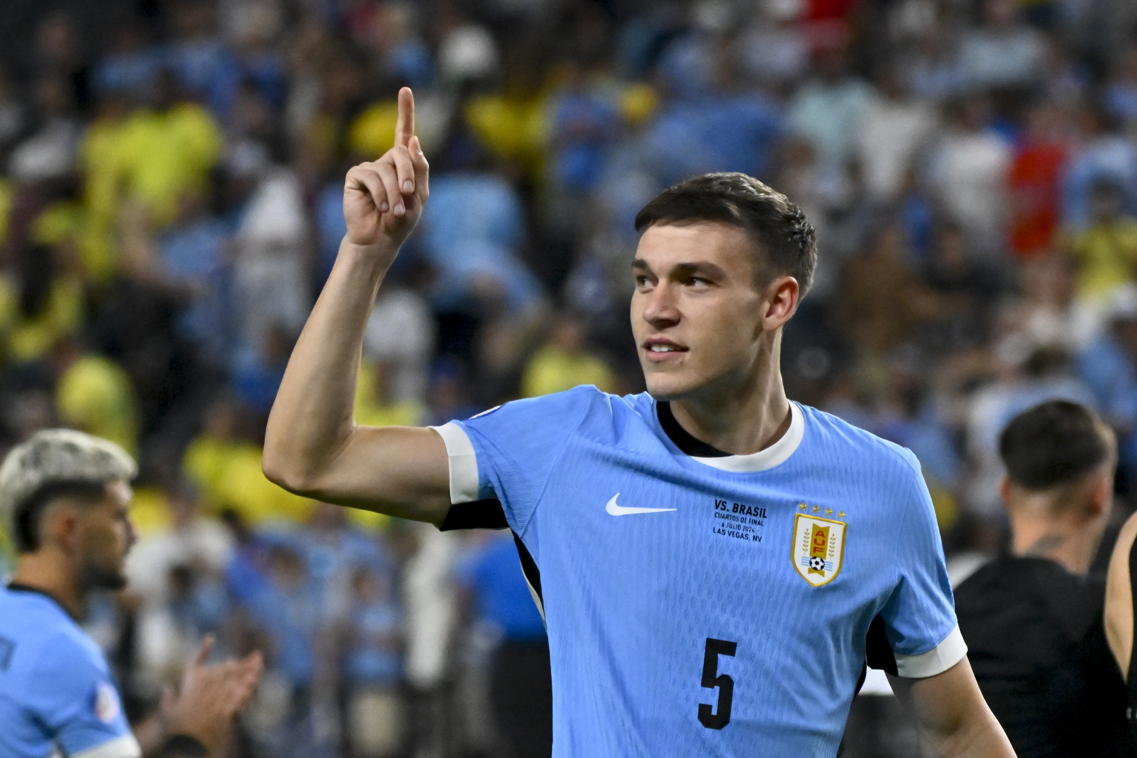FILE - Uruguay's Manuel Ugarte celebrates after defeating Brazil in a penalty shootout during a Copa America quarterfinal soccer match in Las Vegas, July 6, 2024.