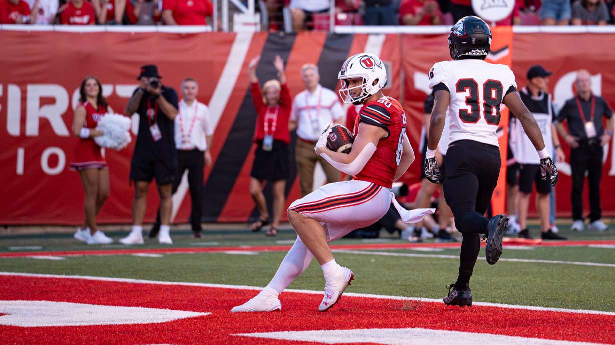 Utah tight end Brant Kuithe scores a touchdown in a game against Southern Utah on Aug. 29, 2024 in Salt Lake City.