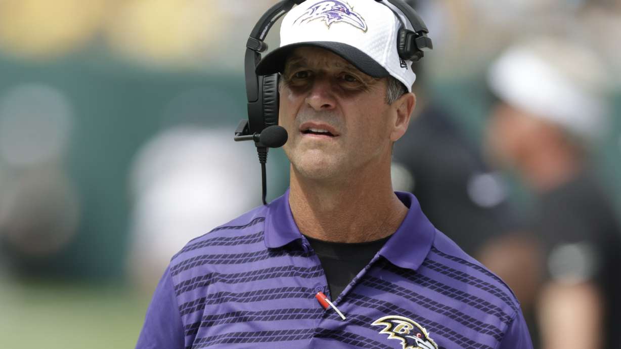 Baltimore Ravens head coach Jiohn Harbaugh watches during the second half of a preseason NFL football game against the Green Bay Packers Saturday, Aug. 24, 2024, in Green Bay, Wis.