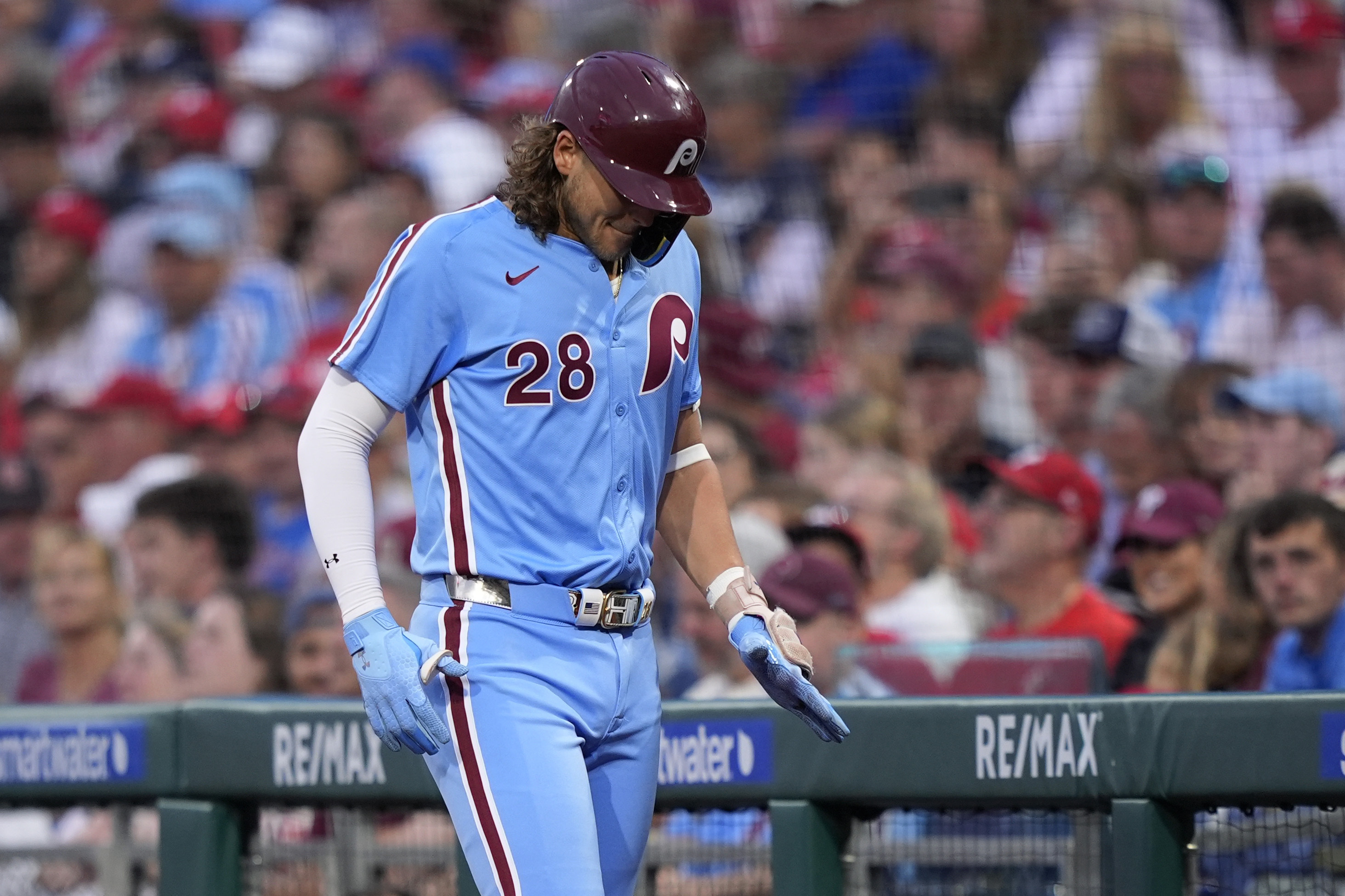 Philadelphia Phillies' Alec Bohm walks to the dugout after grounding out against Atlanta Braves pitcher Charlie Morton during the first inning of a baseball game, Thursday, Aug. 29, 2024, in Philadelphia. 