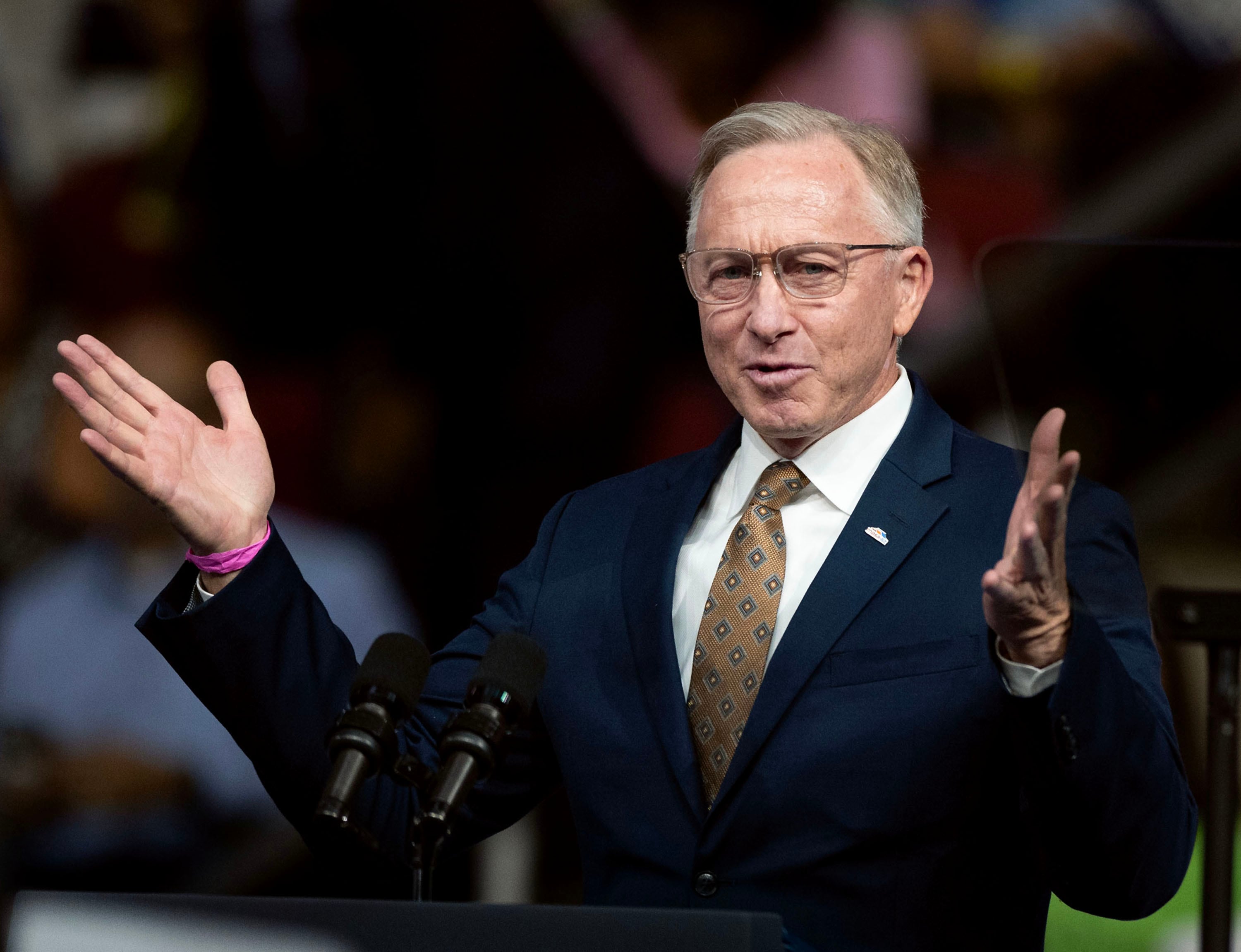 Mayor John Giles, the Republican mayor of Mesa, Ariz., and a member of  The Church of Jesus Christ of Latter-day Saints, speaks at the campaign rally for Vice President Kamala Harris and Minnesota Gov. Tim Walz at Desert Diamond Arena in Glendale, Ariz., on Aug. 9.