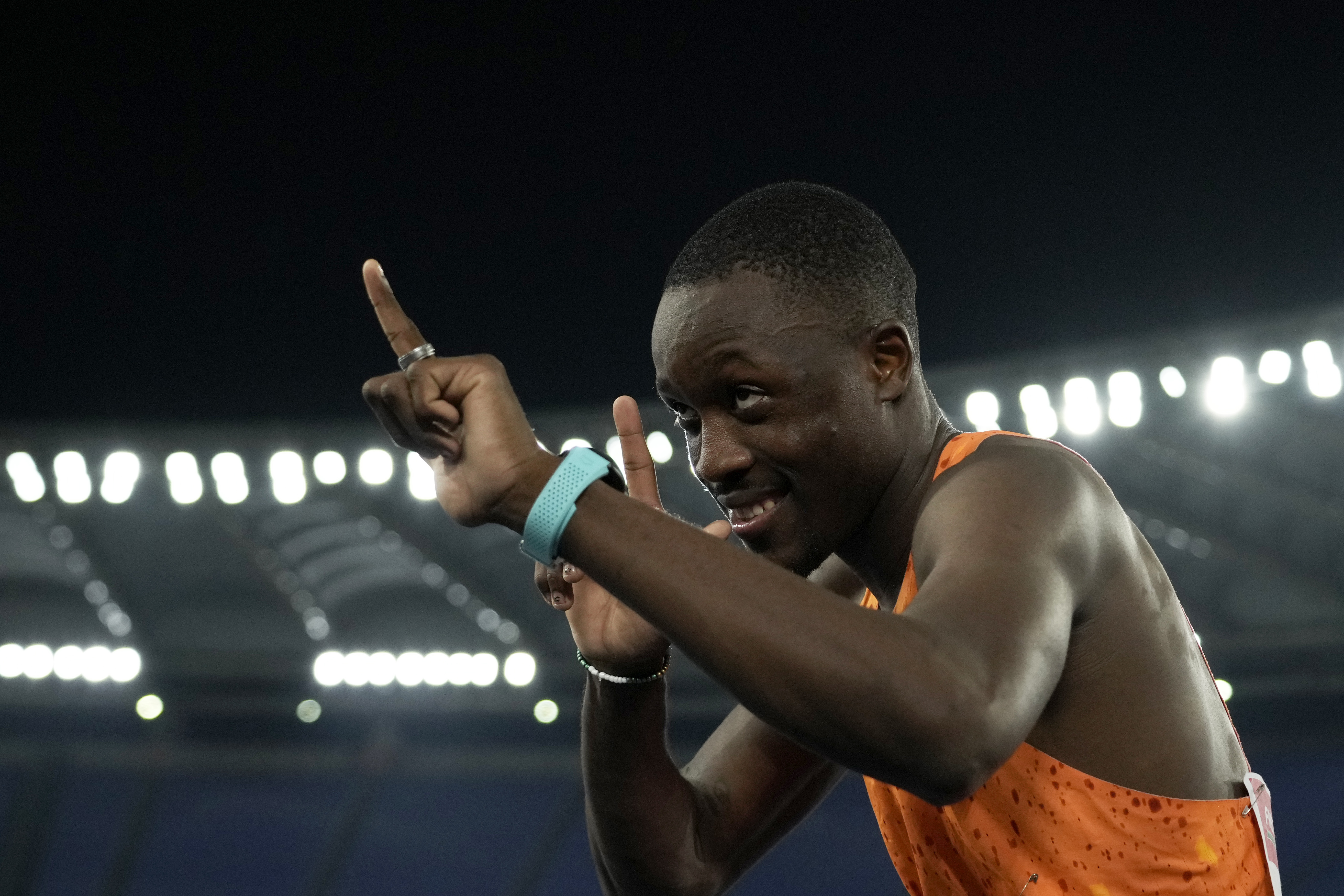 Letsile Tebogo, of Botswana, celebrates after winning the men's 100 meters during the Diamond League Golden Gala Pietro Mennea athletics meet at the Stadio Olimpico in Rome, Friday, Aug. 30, 2024.