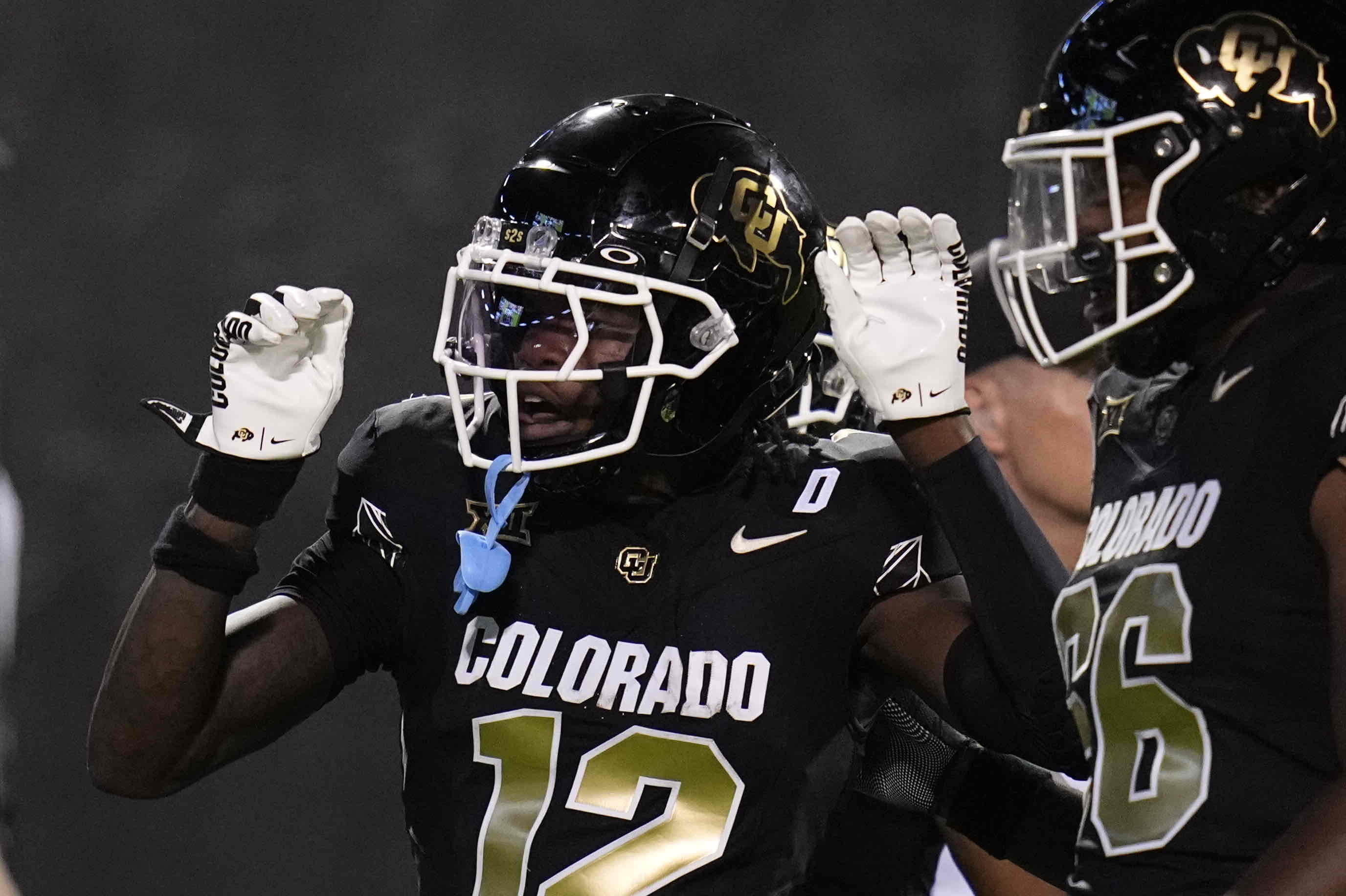 Colorado receiver Travis Hunter celebrates a touchdown during the second half of an NCAA college football game against North Dakota State Thursday, Aug. 29, 2024, in Boulder, Colo.