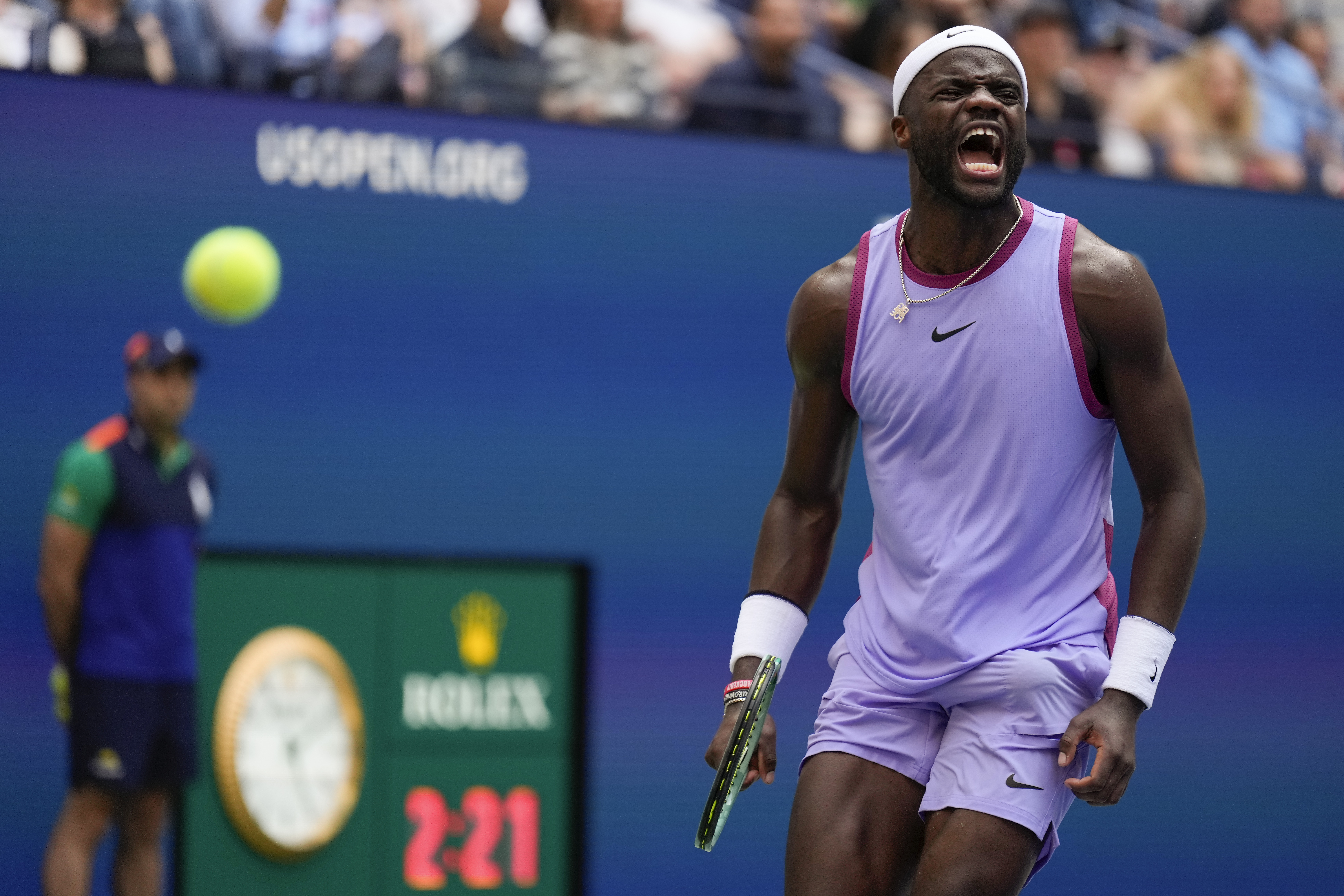Frances Tiafoe, of the United States, reacts after scoring a point against Ben Shelton, of the United States, during the third round of the U.S. Open tennis championships, Friday, Aug. 30, 2024, in New York. 