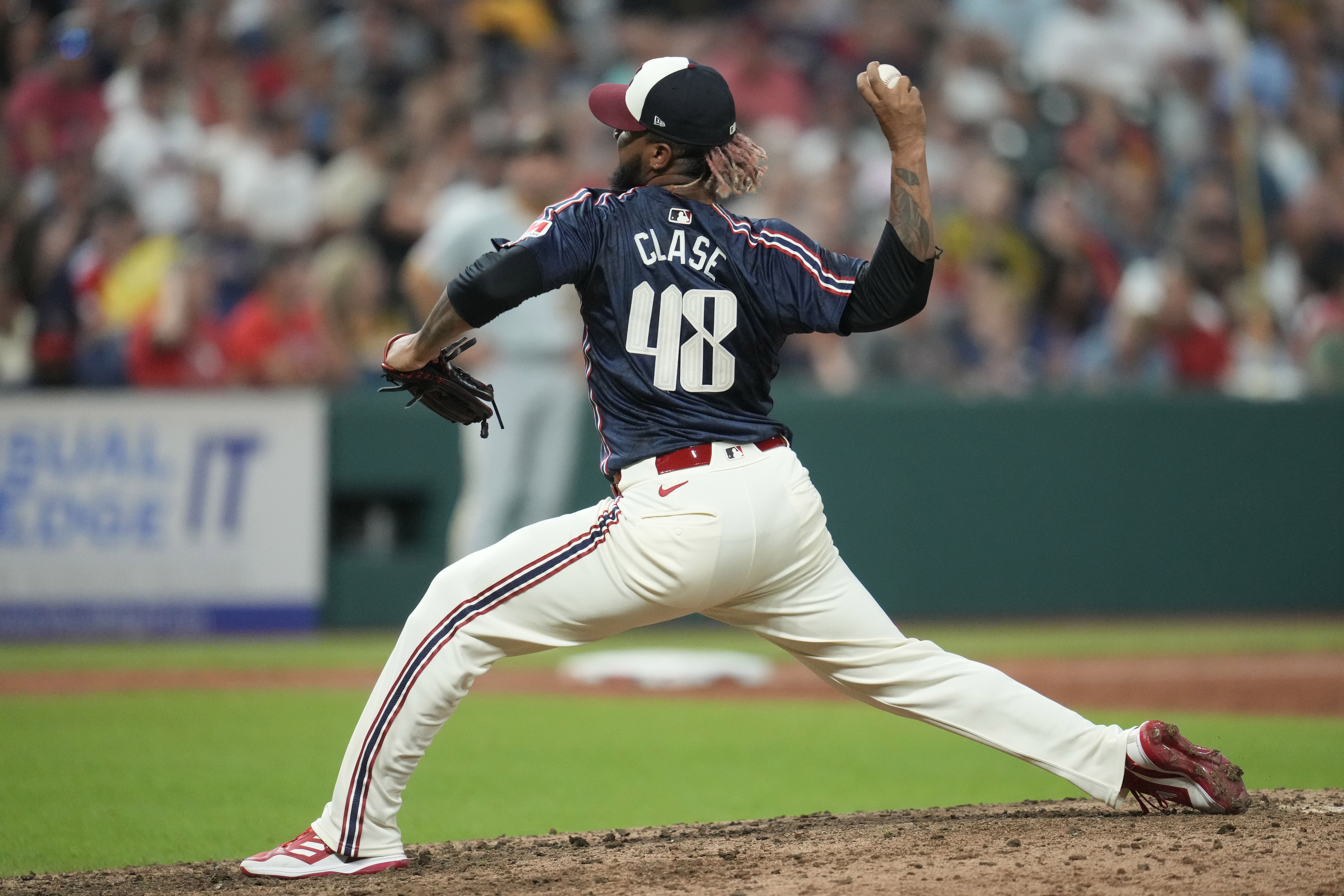 Cleveland Guardians relief pitcher Emmanuel Clase (48) pitches in the ninth inning of a baseball game against the Pittsburgh Pirates Friday, Aug. 30, 2024, in Cleveland. 