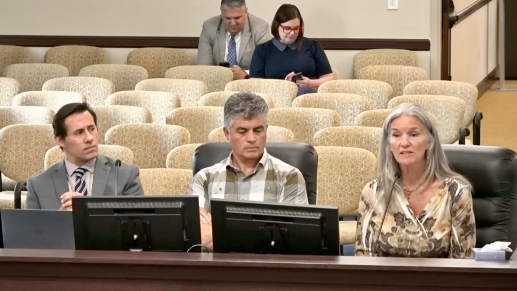 Laura Warburton, right, testifies at a hearing of the Utah Legislature's Political Subdivisions Interim Committee on the incorporation process on June 19 at the Senate Building in Salt Lake City.