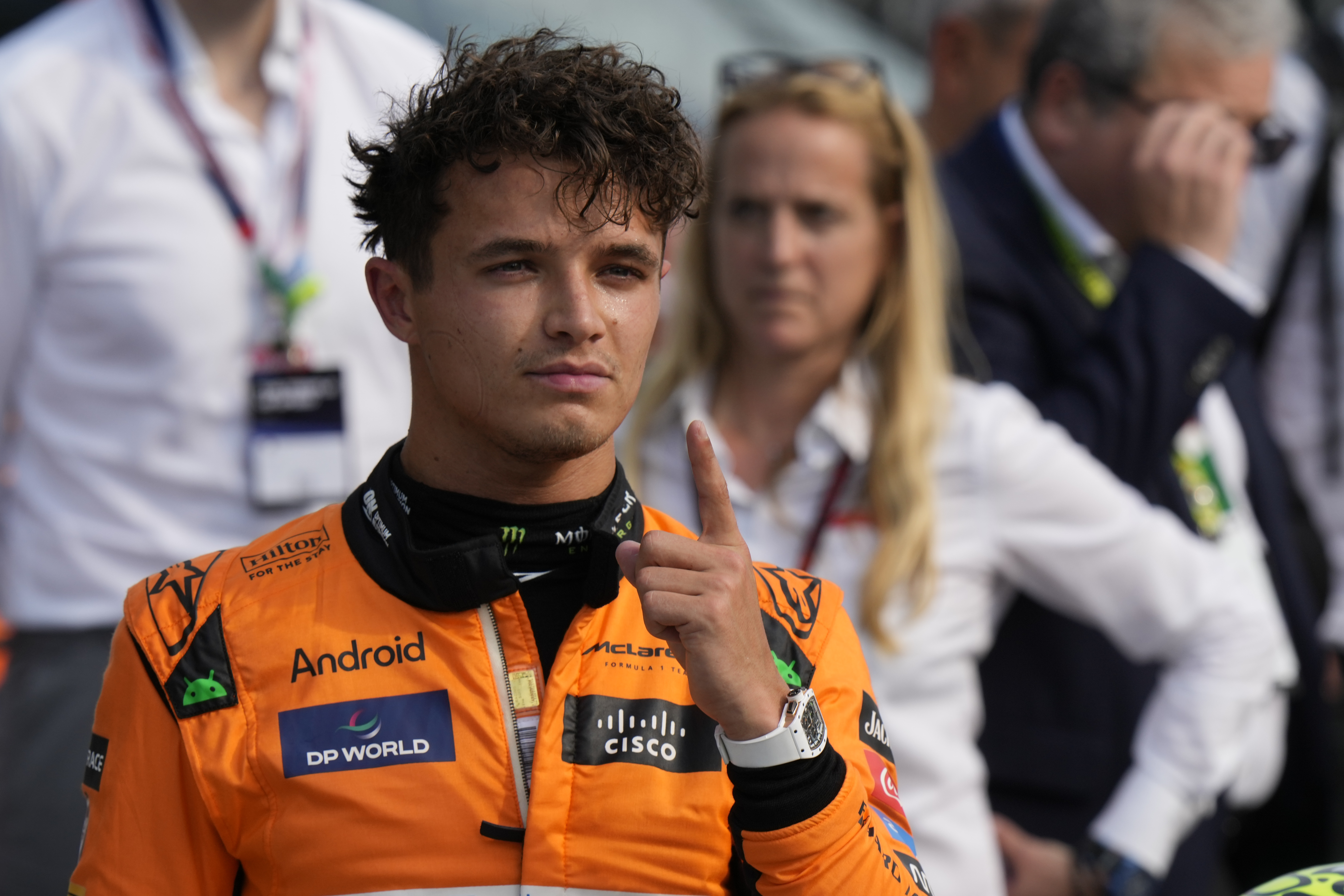 McLaren driver Lando Norris of Britain celebrates his pole position after qualifying session ahead of the Formula One Italian Grand Prix race at the Monza racetrack, in Monza, Italy, Saturday, Aug. 31, 2024.