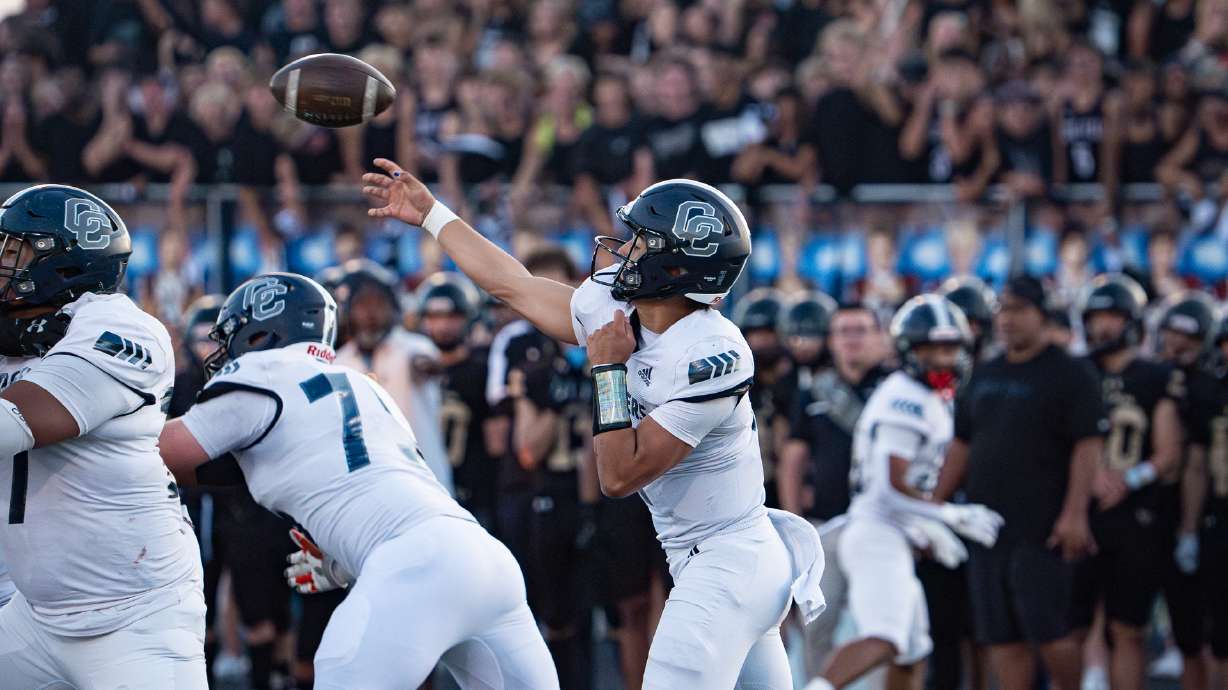 Corner Canyon quarterback Helaman Casuga throws a pass during a game against Lone Peak in Highland on Aug. 30, 2024.