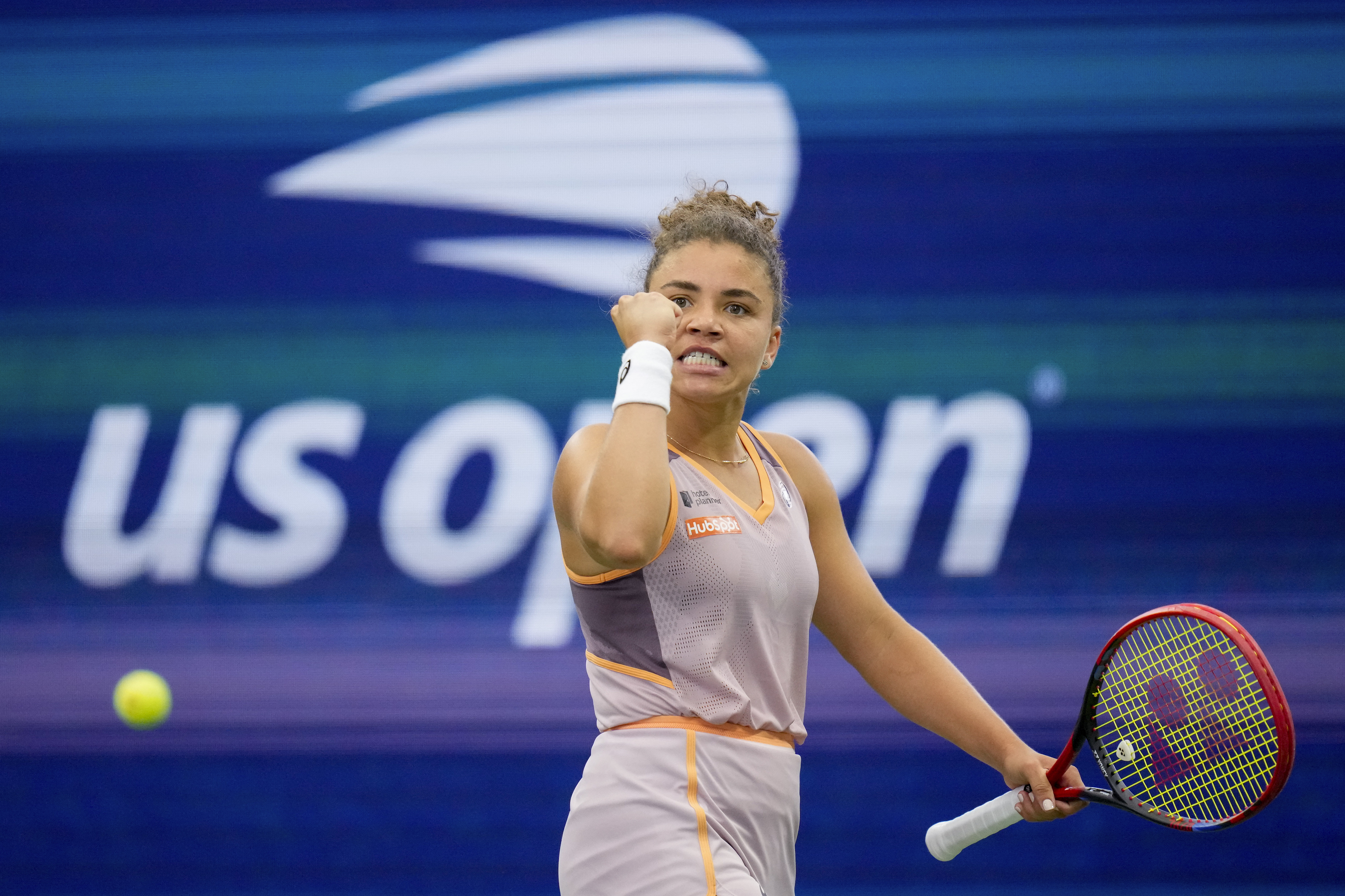 Jasmine Paolini, of Italy, reacts after scoring a point against Yulia Putintseva, of Kazakhstan, of the United States, during the third round of the U.S. Open tennis championships, Saturday, Aug. 31, 2024, in New York.