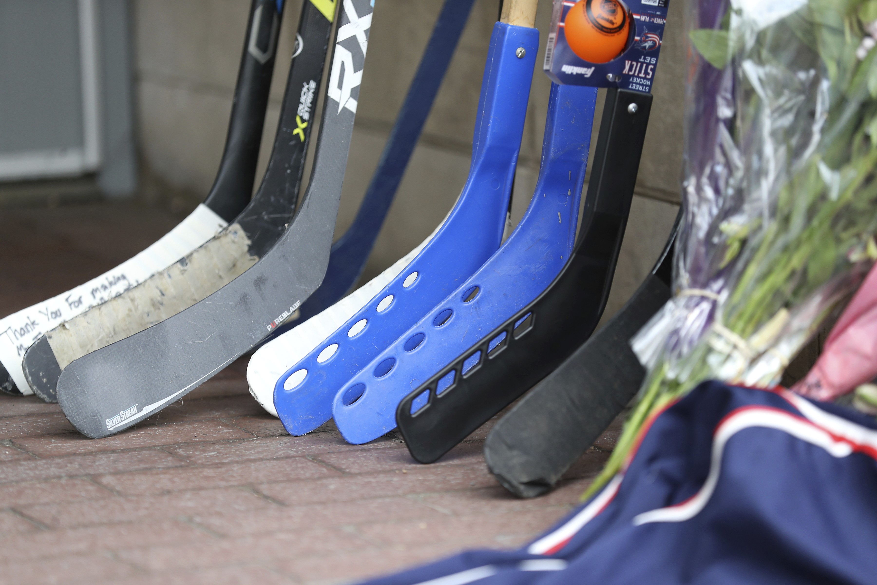 A memorial is set up by fans for Blue Jackets hockey player Johnny Gaudreau in Columbus, Ohio, Aug. 30, 2024. Gaudreau, along with his brother Matthew, was fatally struck by a motorist while riding his bicycle on Thursday.