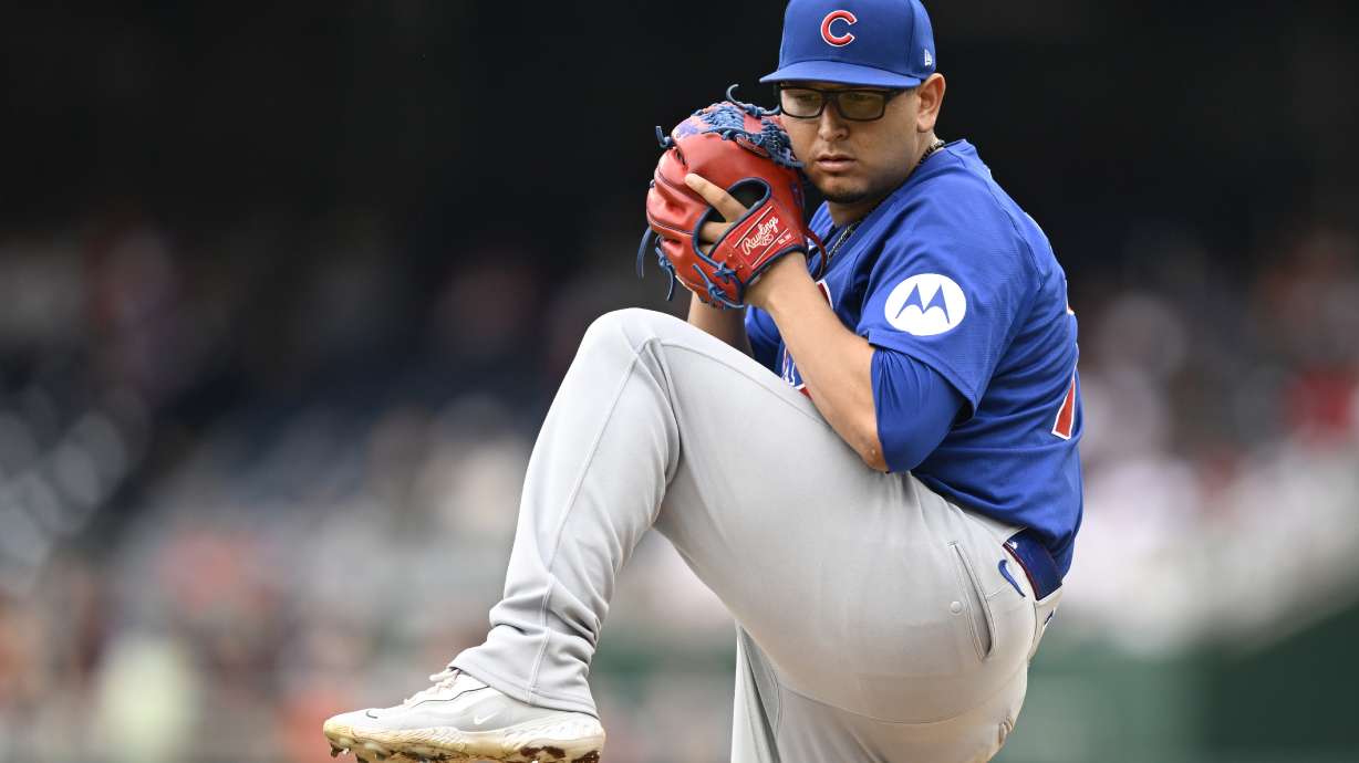 Chicago Cubs starting pitcher Javier Assad winds up during the second inning of a baseball game against the Washington Nationals, Saturday, Aug. 31, 2024, in Washington.