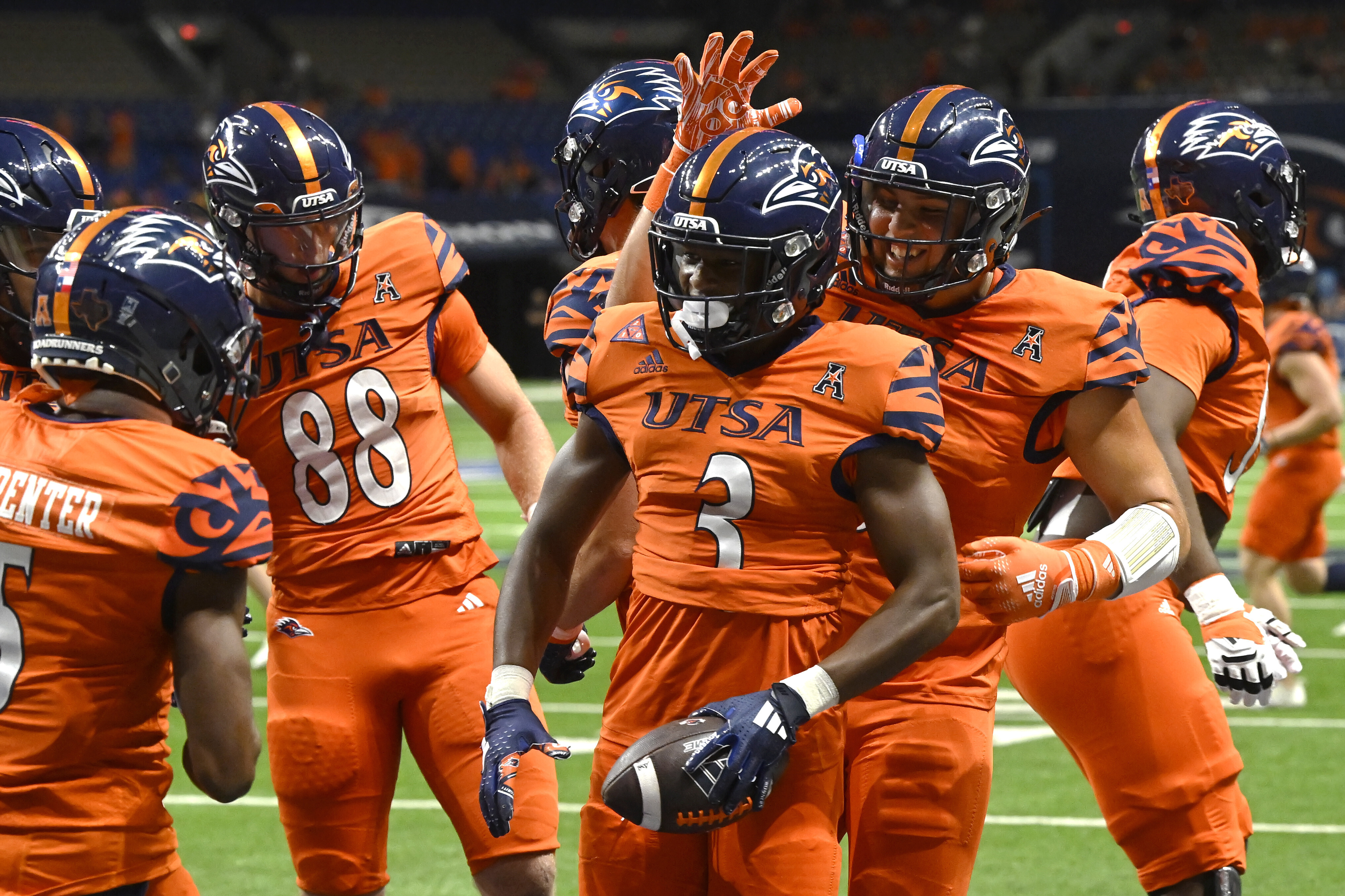 UTSA's Devin McCuin (3) celebrates a touchdown during the first half of an NCAA college football game against Kennesaw State, Saturday, Aug. 31, 2024, in San Antonio. 