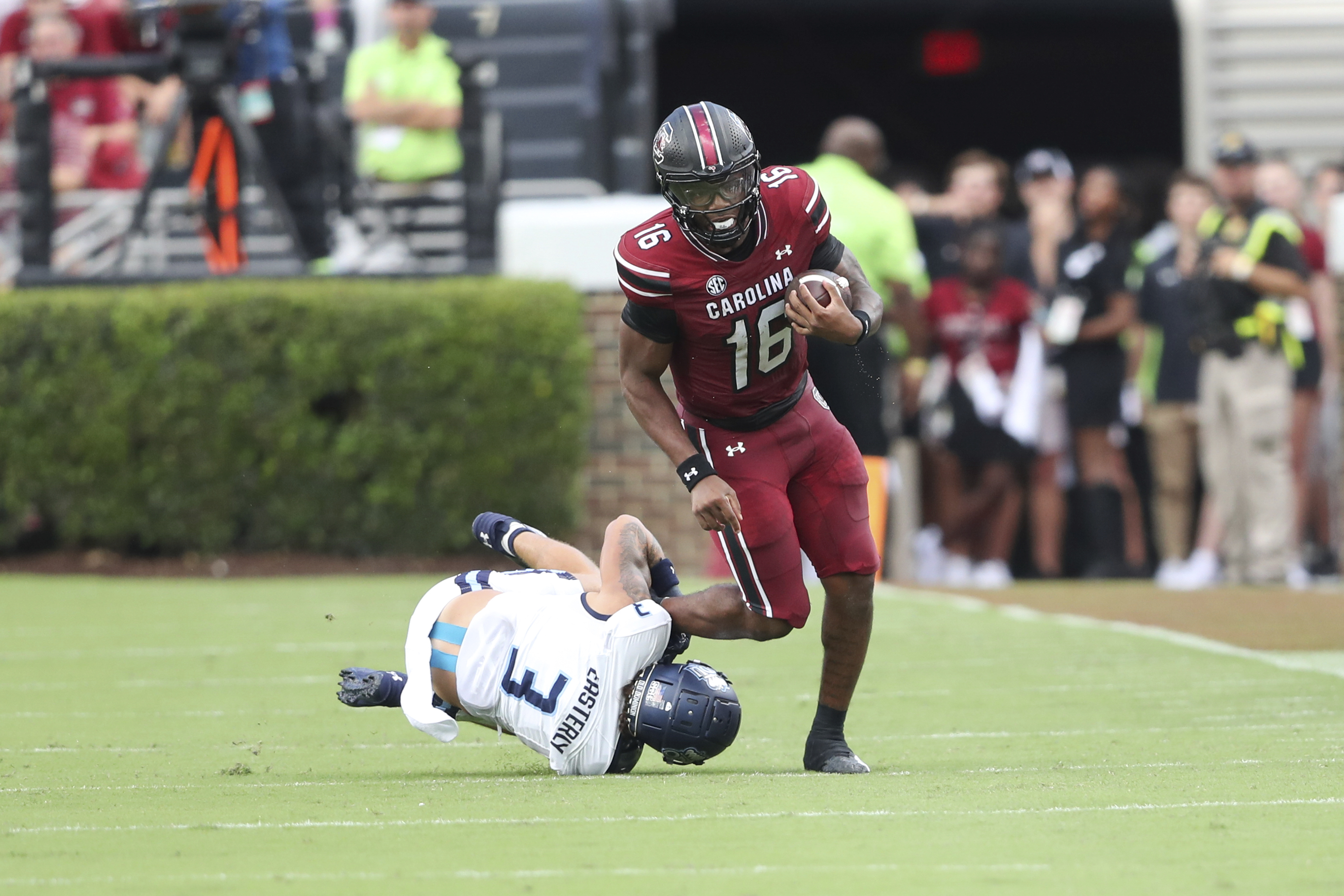 Old Dominion safety Mario Easterly (3) tackles South Carolina quarterback LaNorris Sellers (16) during the first half of an NCAA college football game Saturday, Aug. 31, 2024, in Columbia, S.C. 