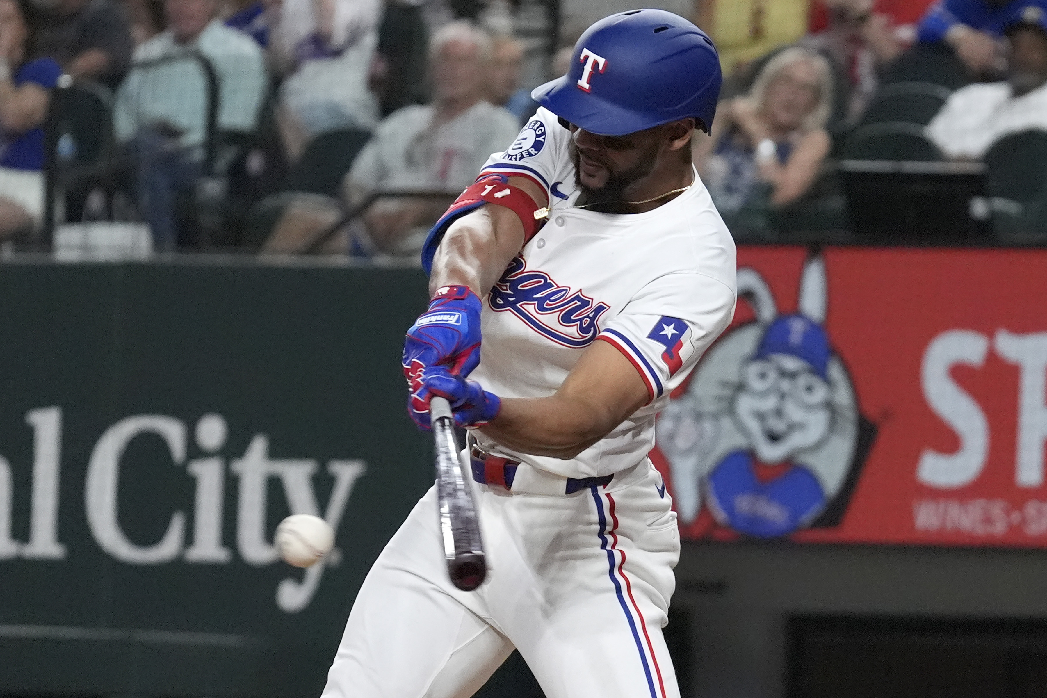 Texas Rangers' Leody Taveras hits a bases loaded single scoring teammate Ezequiel Duran ending the ninth inning to win a baseball game against the Oakland Athletics, Saturday, Aug. 31, 2024, in Arlington, Texas. 