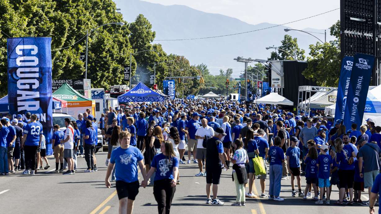 BYU fans walk through Cougar Canyon before the home opener of the Brigham Young University Cougars held against the Southern Illinois University Salukis at LaVell Edwards Stadium in Provo on Saturday, Aug. 31, 2024.