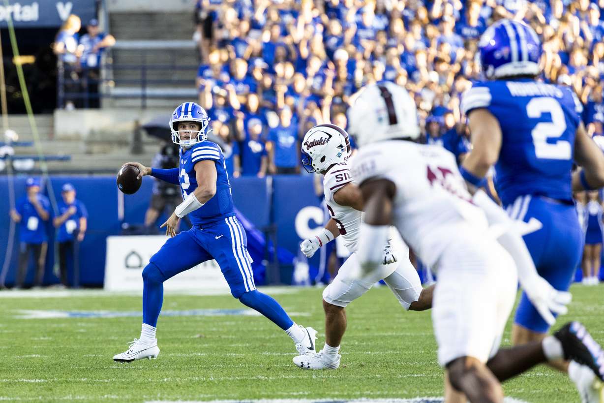 Brigham Young quarterback Jake Retzlaff (12) looks to pass during BYU’s home opener against Southern Illinois held at LaVell Edwards Stadium in Provo on Saturday, Aug. 31, 2024.