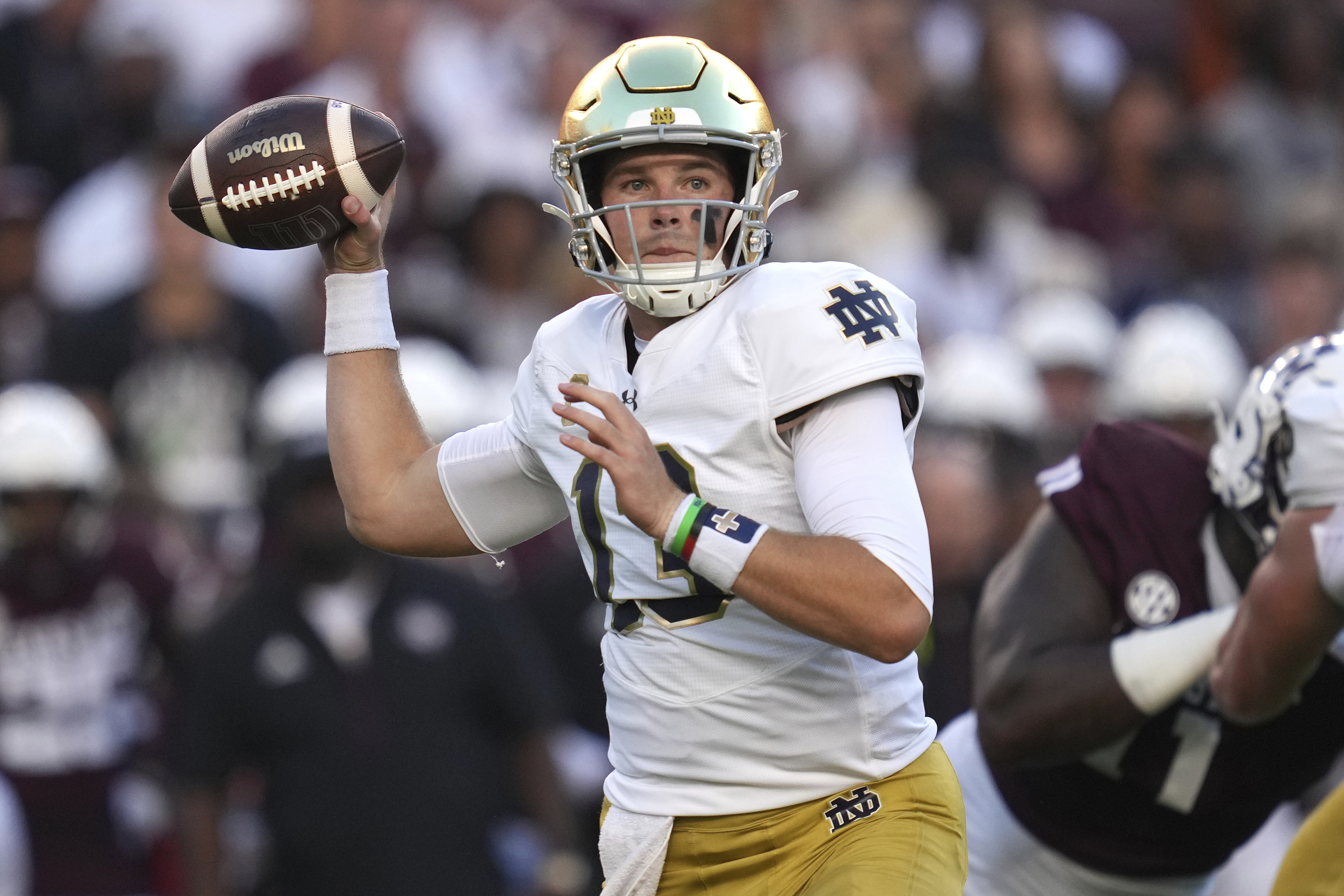 Notre Dame quarterback Riley Leonard (13) passes the ball against the Texas A&M during the first half of an NCAA college football game Saturday, Aug. 31, 2024, in College Station, Texas. 