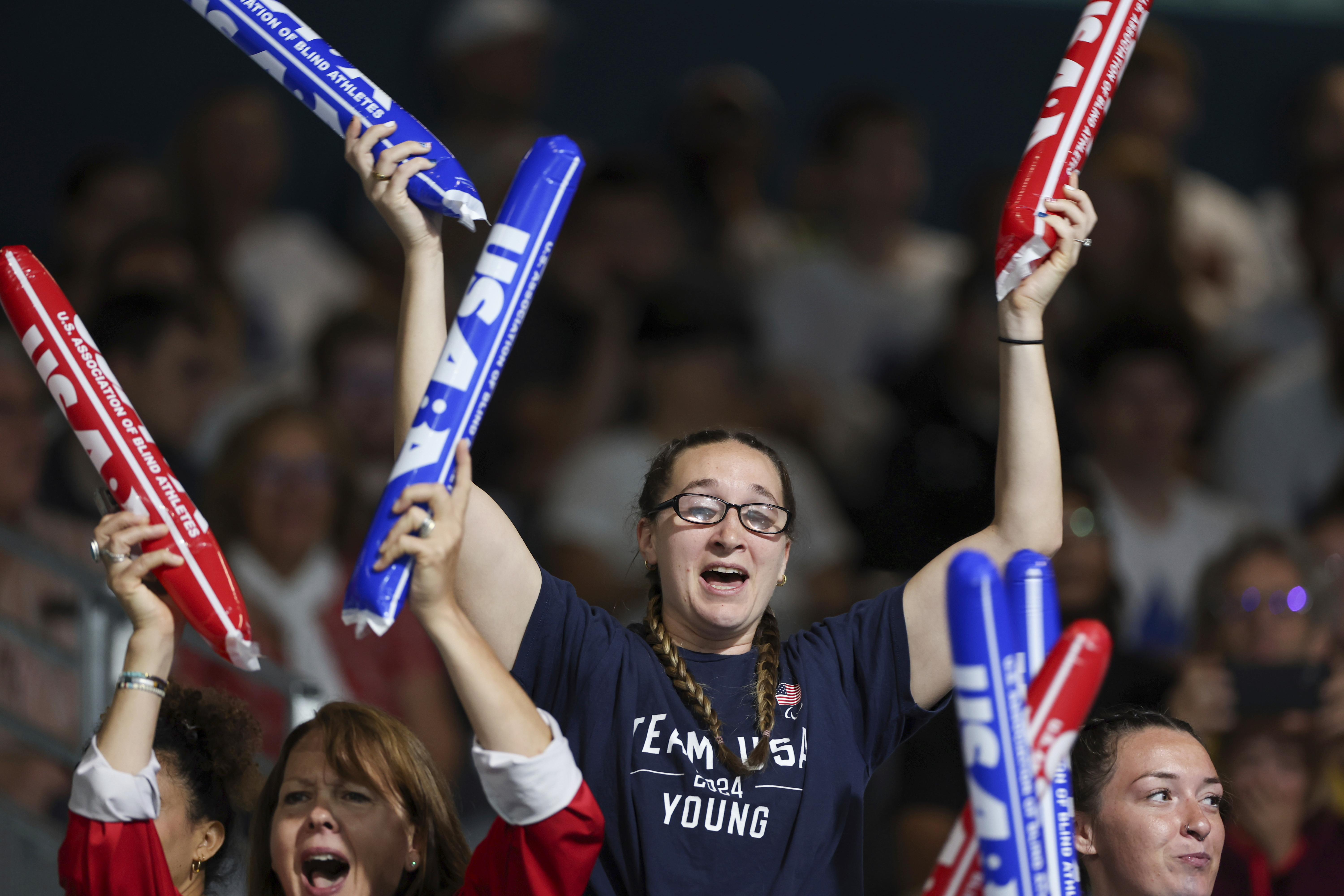 Eliana Mason, an American goalball Paralympian, cheers on fiancé Calahan Young, during a match between the U.S. and Brazil mens' goalball teams on Friday, August 30, 2024 at the South Paris Arena during the Paralympic Games in Paris. Young is the U.S. men's team captain. Brazil won the match 13-8. 