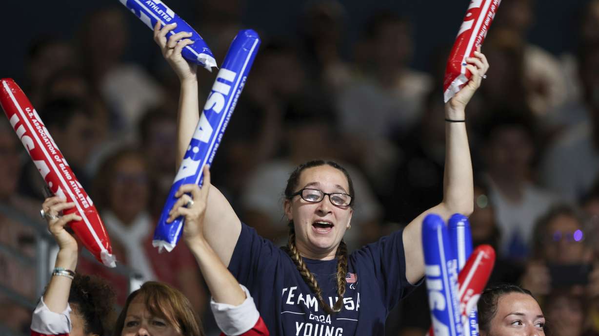 Eliana Mason, an American goalball Paralympian, cheers on fiancé Calahan Young, during a match between the U.S. and Brazil mens' goalball teams on Friday, August 30, 2024 at the South Paris Arena during the Paralympic Games in Paris. Young is the U.S. men's team captain. Brazil won the match 13-8.