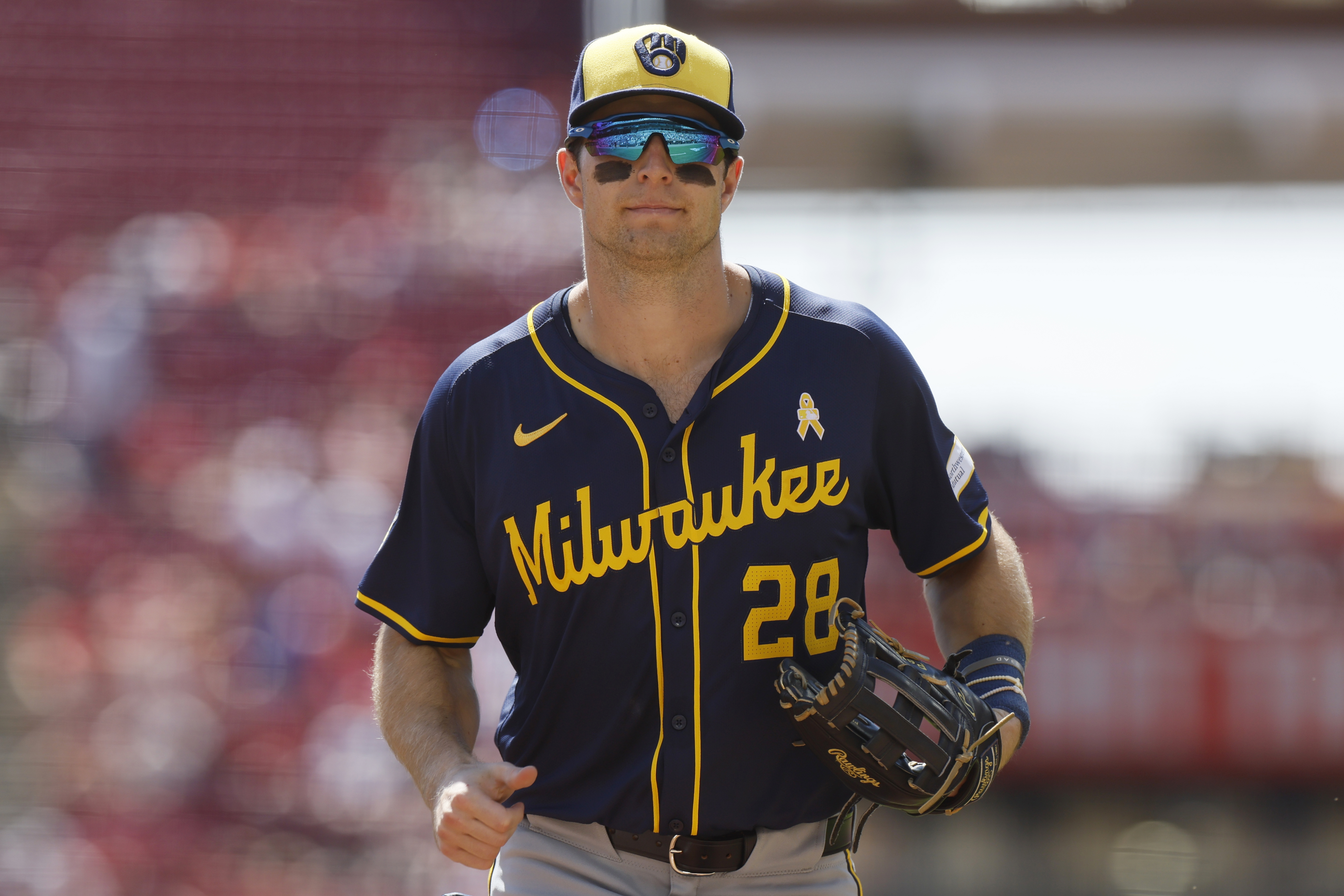 Milwaukee Brewers right fielder Brewer Hicklen runs off the field against the Cincinnati Reds during the third inning of a baseball game Sunday, Sept. 1, 2024, in Cincinnati. 