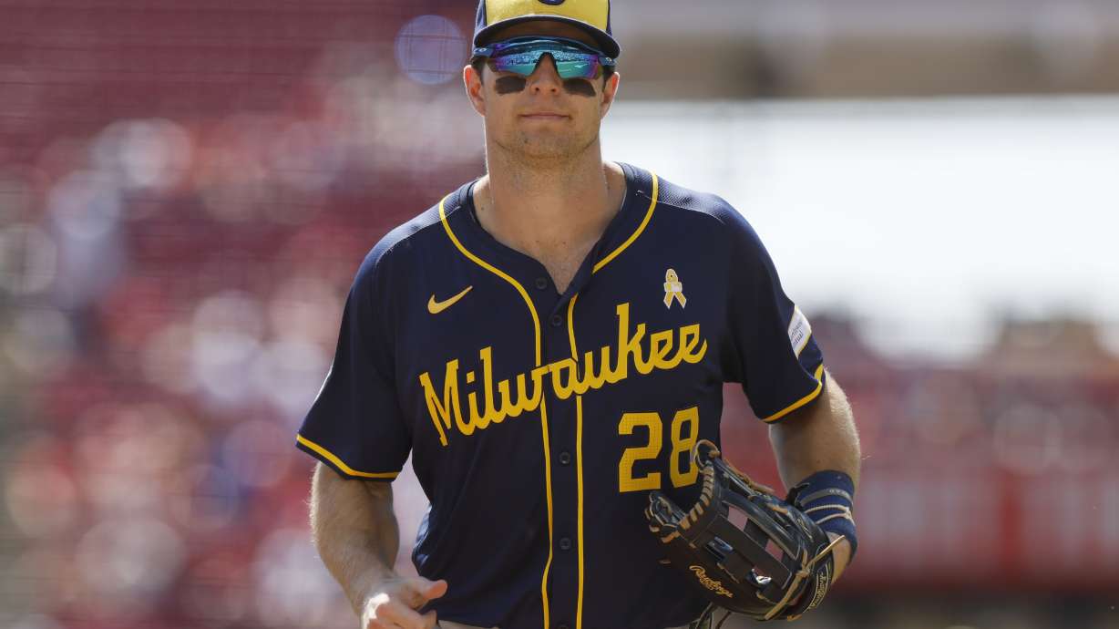 Milwaukee Brewers right fielder Brewer Hicklen runs off the field against the Cincinnati Reds during the third inning of a baseball game Sunday, Sept. 1, 2024, in Cincinnati.