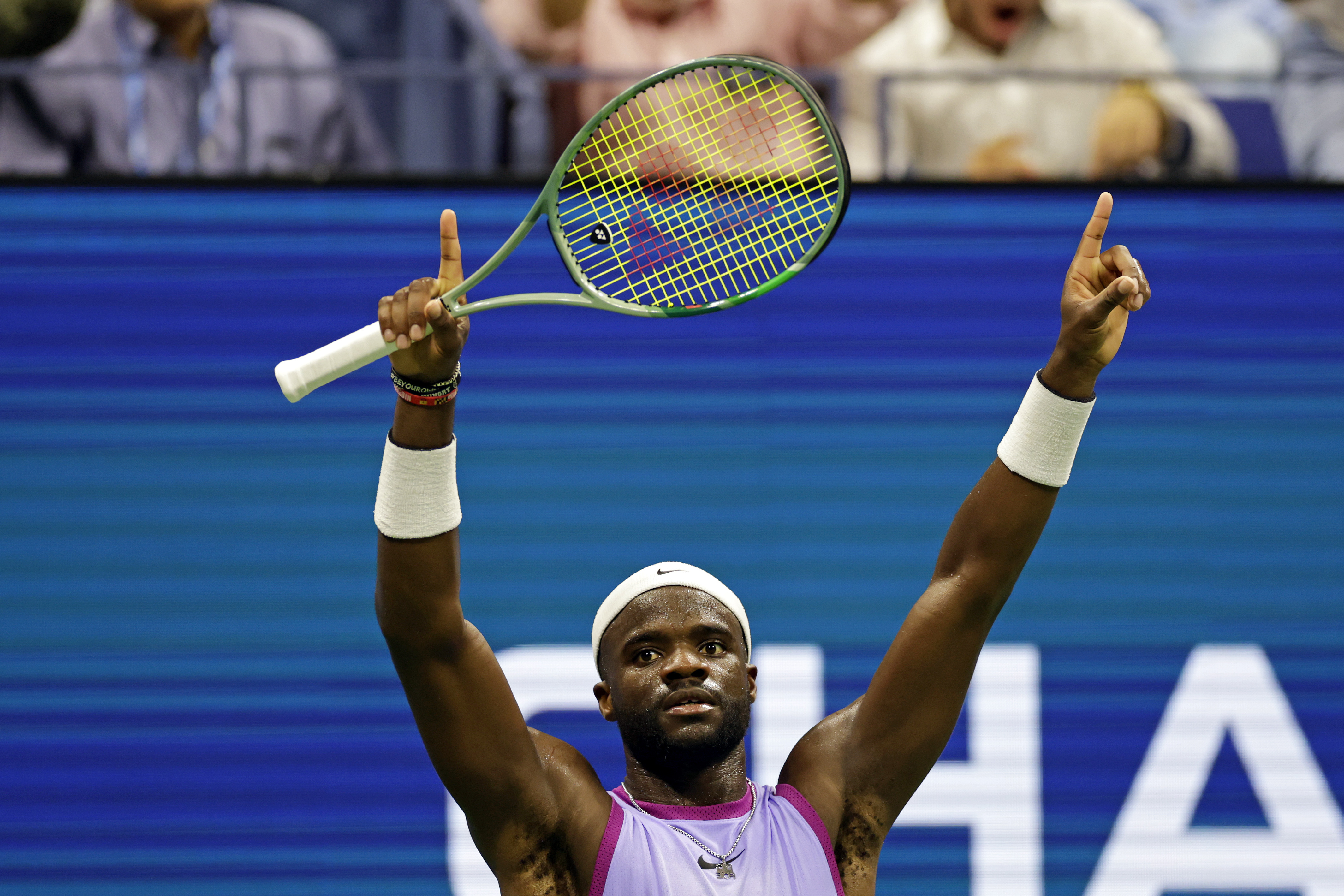 Frances Tiafoe, of the United States, reacts during a match against Alexei Popyrin, of Australia, during the fourth round of the U.S. Open tennis tournament Sunday, Sept. 1, 2024, in New York. 