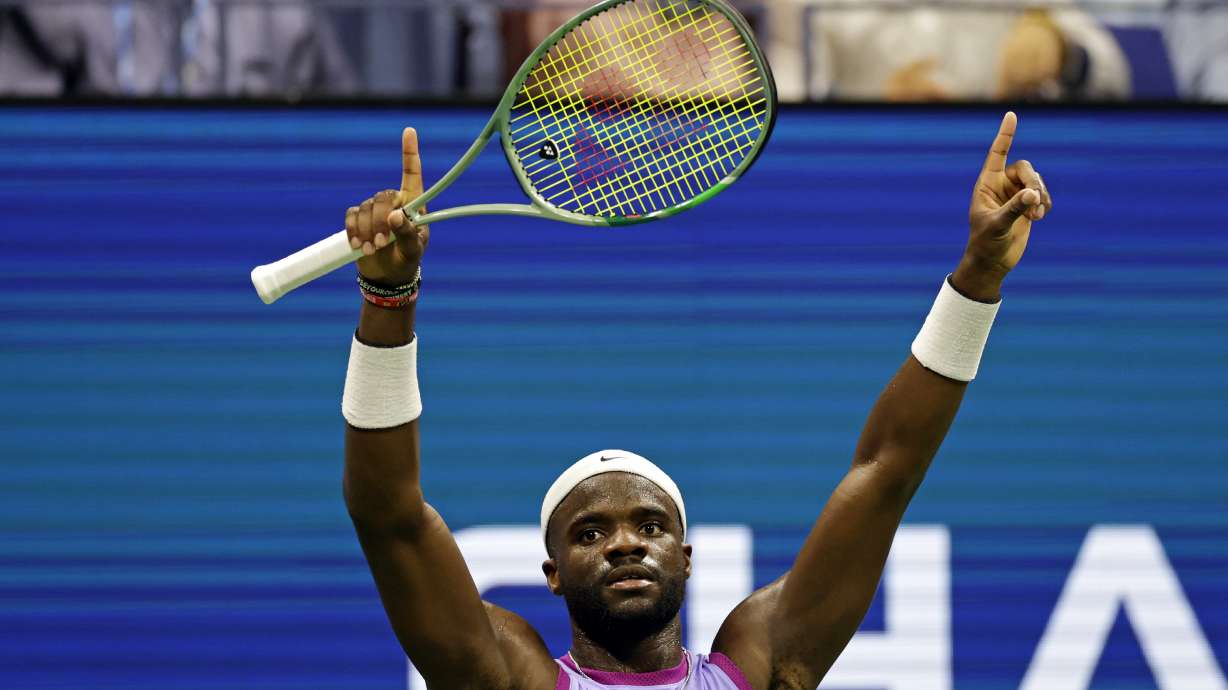 Frances Tiafoe, of the United States, reacts during a match against Alexei Popyrin, of Australia, during the fourth round of the U.S. Open tennis tournament Sunday, Sept. 1, 2024, in New York.