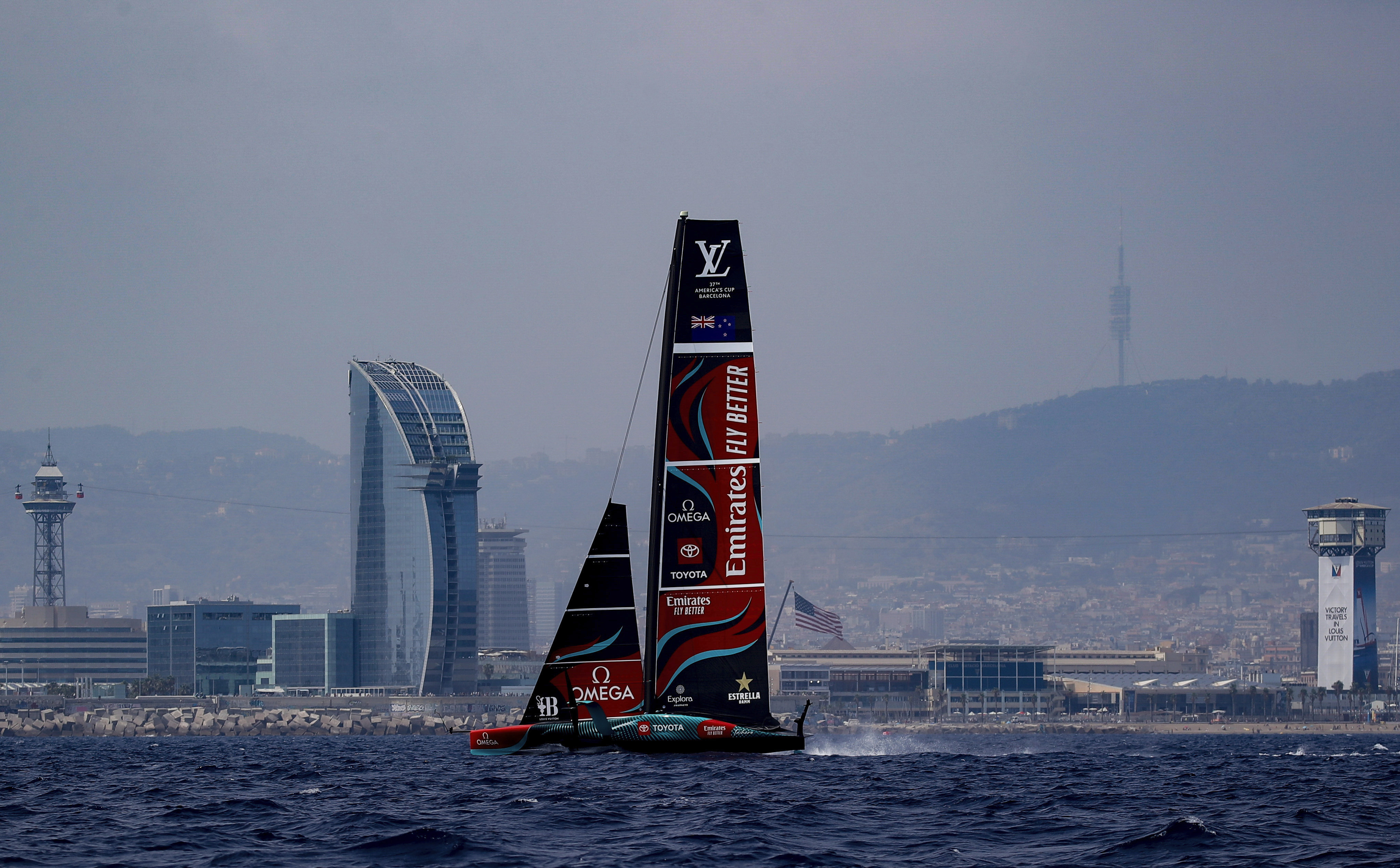 Emirates Team New Zealand's AC75 boat sails during America's Cup Preliminary Regatta ahead of the 37th America's Cup sailing race at the Barcelona's coast, Spain, Thursday, Aug. 22, 2024. The world's oldest international sports trophy, best yachtsmen and cutting-edge design and technology will come together in Barcelona when the 37th edition of the America's Cup starts on Thursday. 