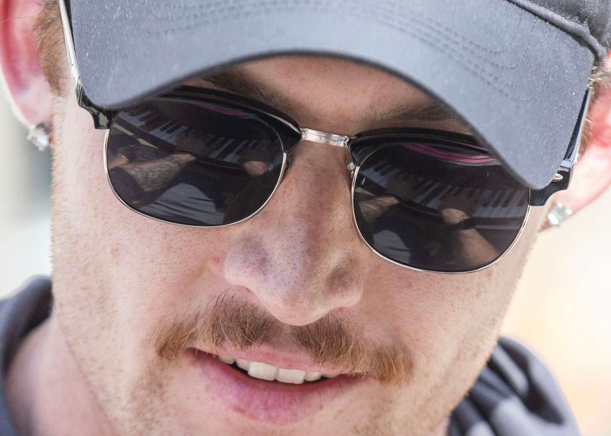 Luke Dahl’s hands playing on the keys of one of the colorful pianos in front of Maurice Abravanel Hall can be seen in the reflection of his sunglasses in Salt Lake City on Aug. 10. The piano is part of a concert and art project called "Key Changes” that invites anyone to come play on the pianos outside of Abravanel Hall. The project also includes outdoor concerts held in the plaza on June 28, July 26, Aug. 23 and one more set for Sept. 26.