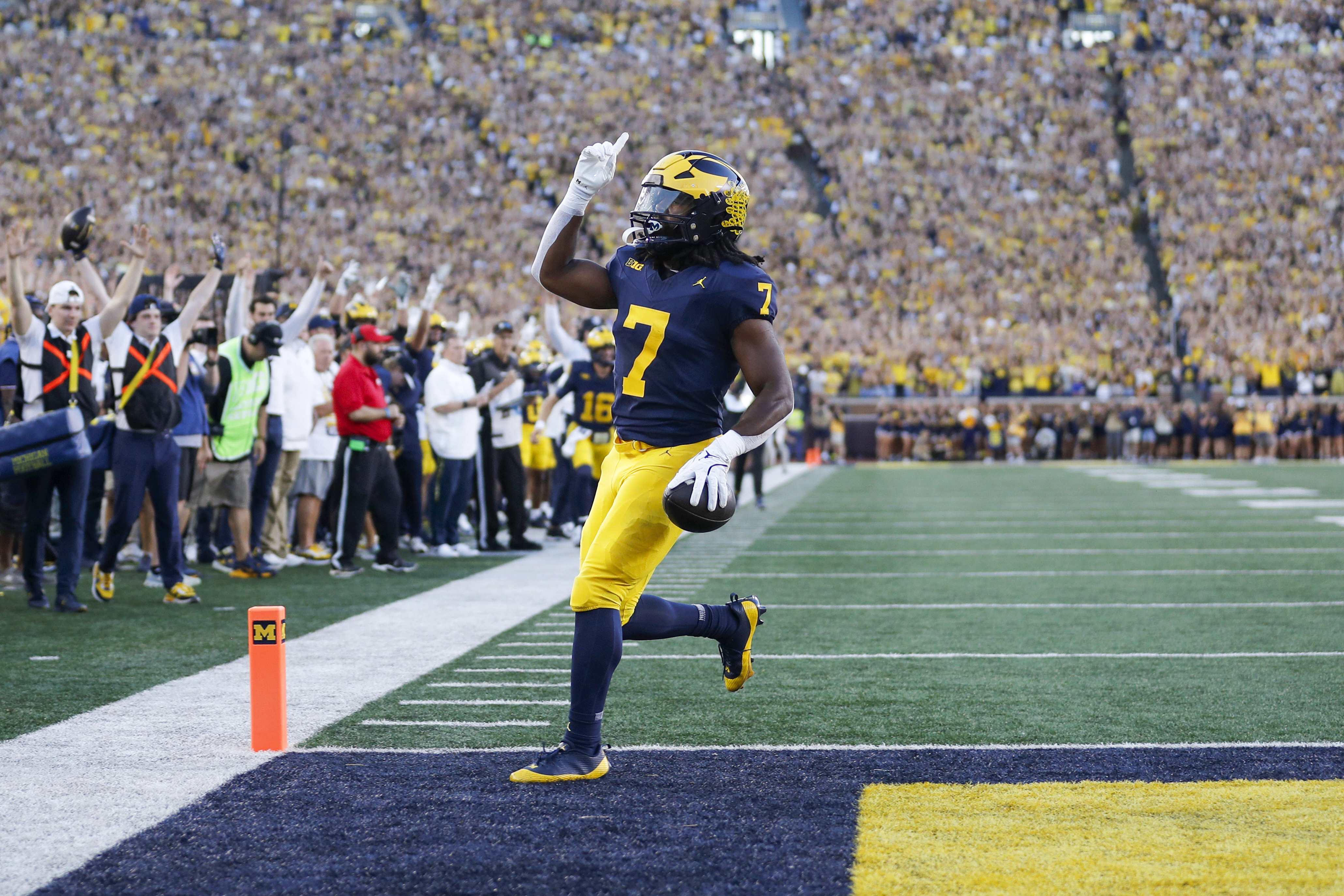 Michigan running back Donovan Edwards scores on a pass reception during the first quarter of an NCAA college football game against Fresno State, Saturday, Aug. 31, 2024, in Ann Arbor, Mich.
