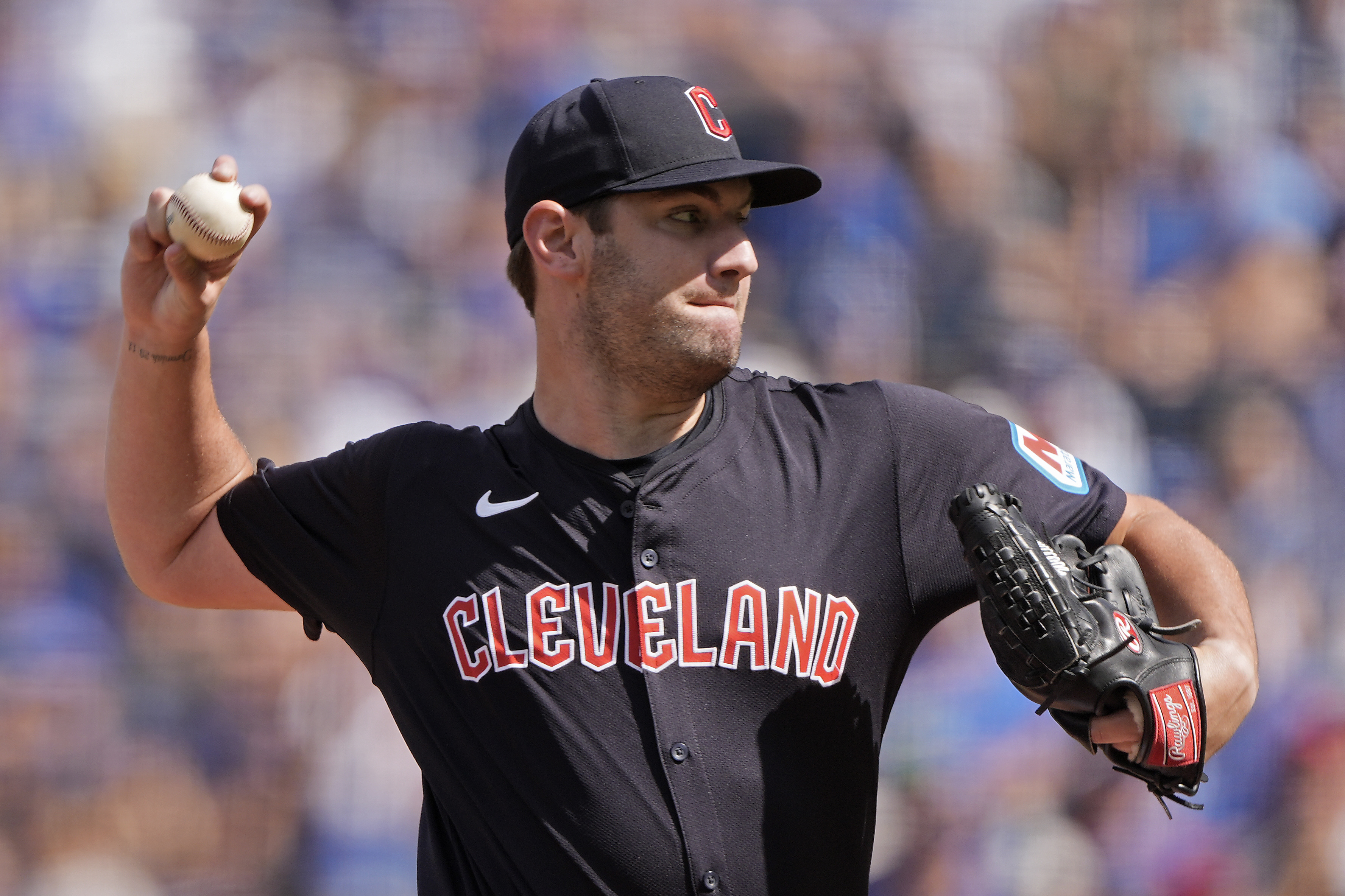 Cleveland Guardians starting pitcher Gavin Williams throws during the first inning of a baseball game against the Kansas City Royals Monday, Sept. 2, 2024, in Kansas City, Mo.