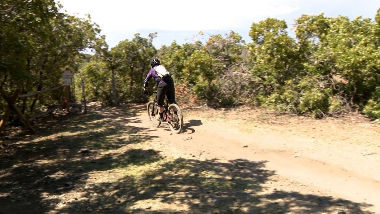 Mountain biker rides on Corner Canyon trails in the Draper area on Monday. Some trails have been impacted since a landslide in April 2023.
