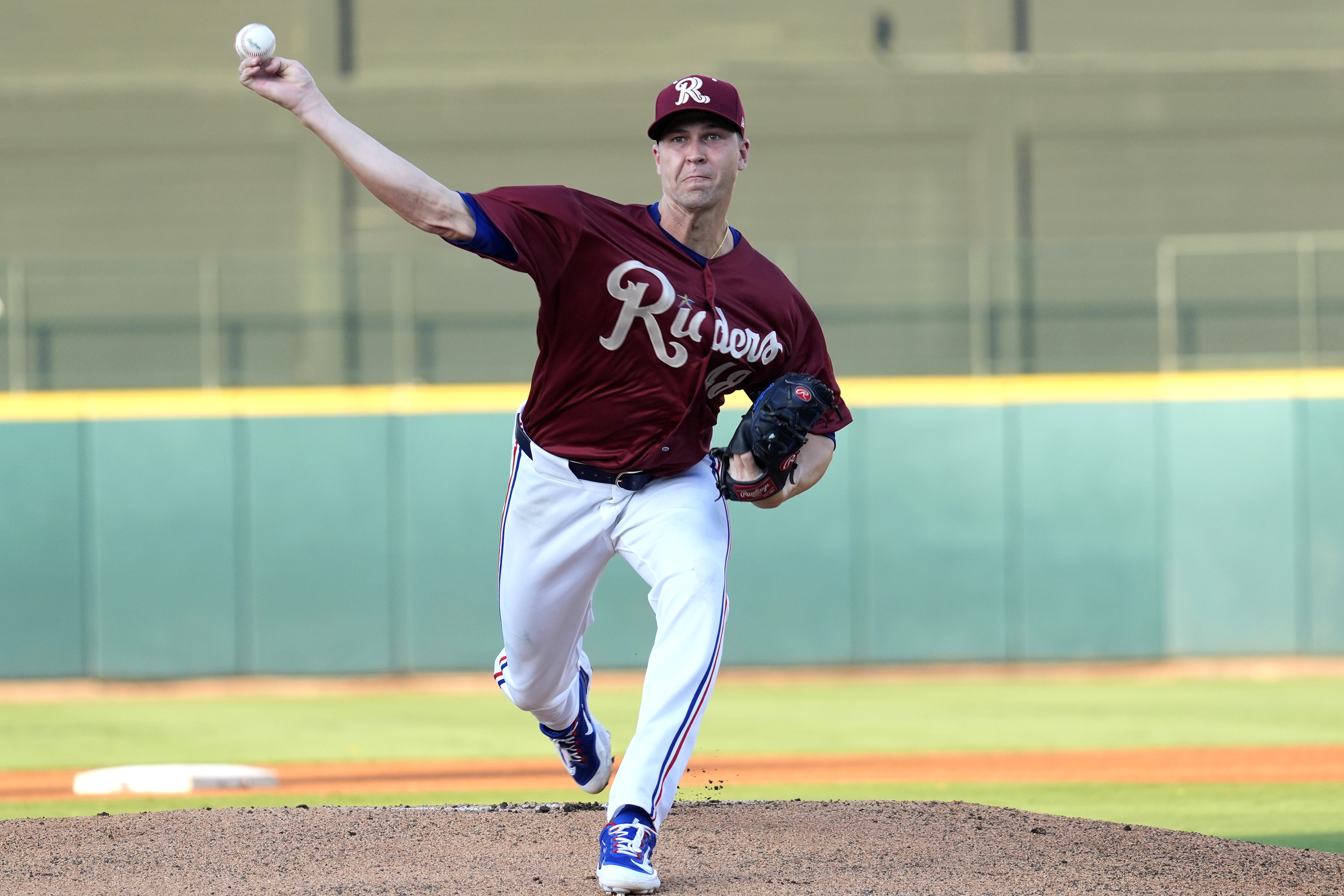 Texas Rangers pitcher Jacob deGrom throws during his rehab start in a Frisco Rough Riders baseball game in Frisco, Texas, Thursday, Aug. 22, 2024, 