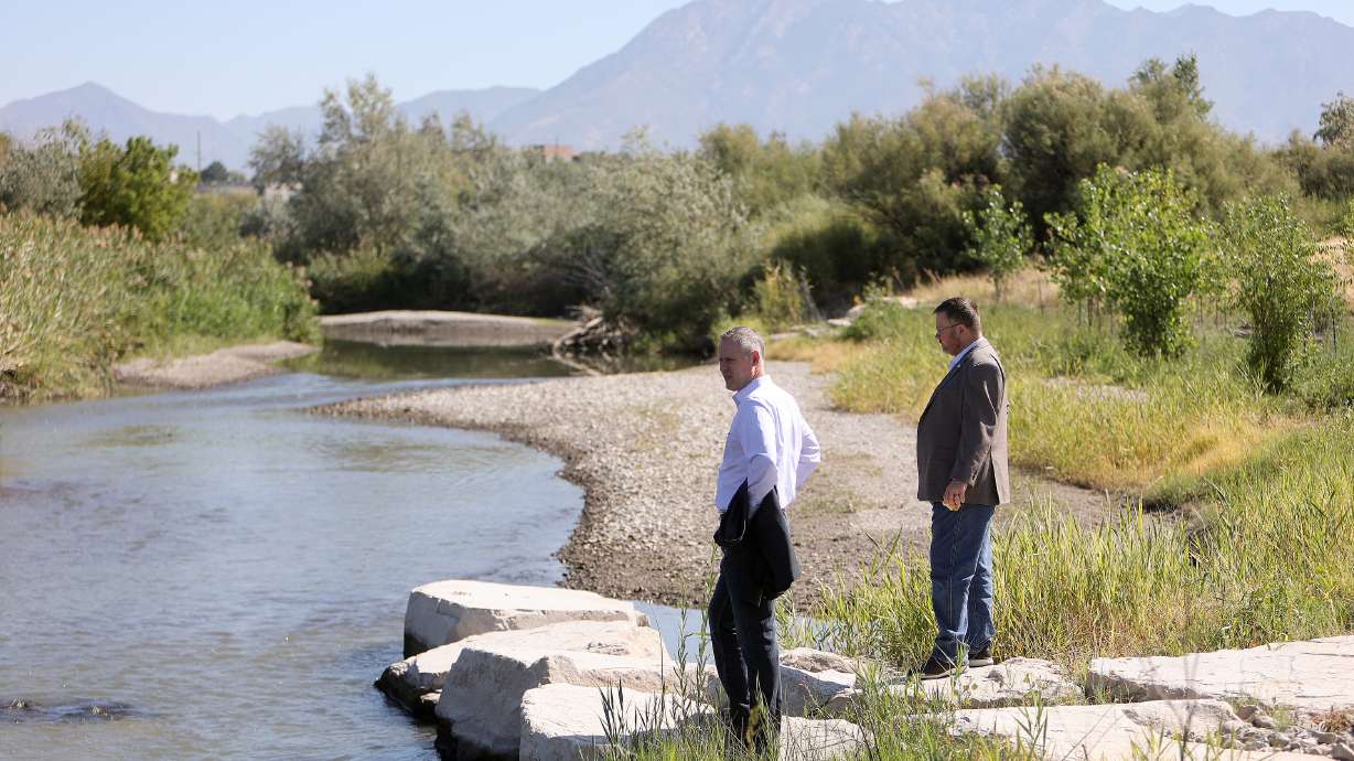 Paul Jerome, West Jordan City assistant chief administrative officer, and West Jordan City Councilman Kent Shelton explore Big Bend Nature Park and Preserve during a media event in West Jordan on Friday.