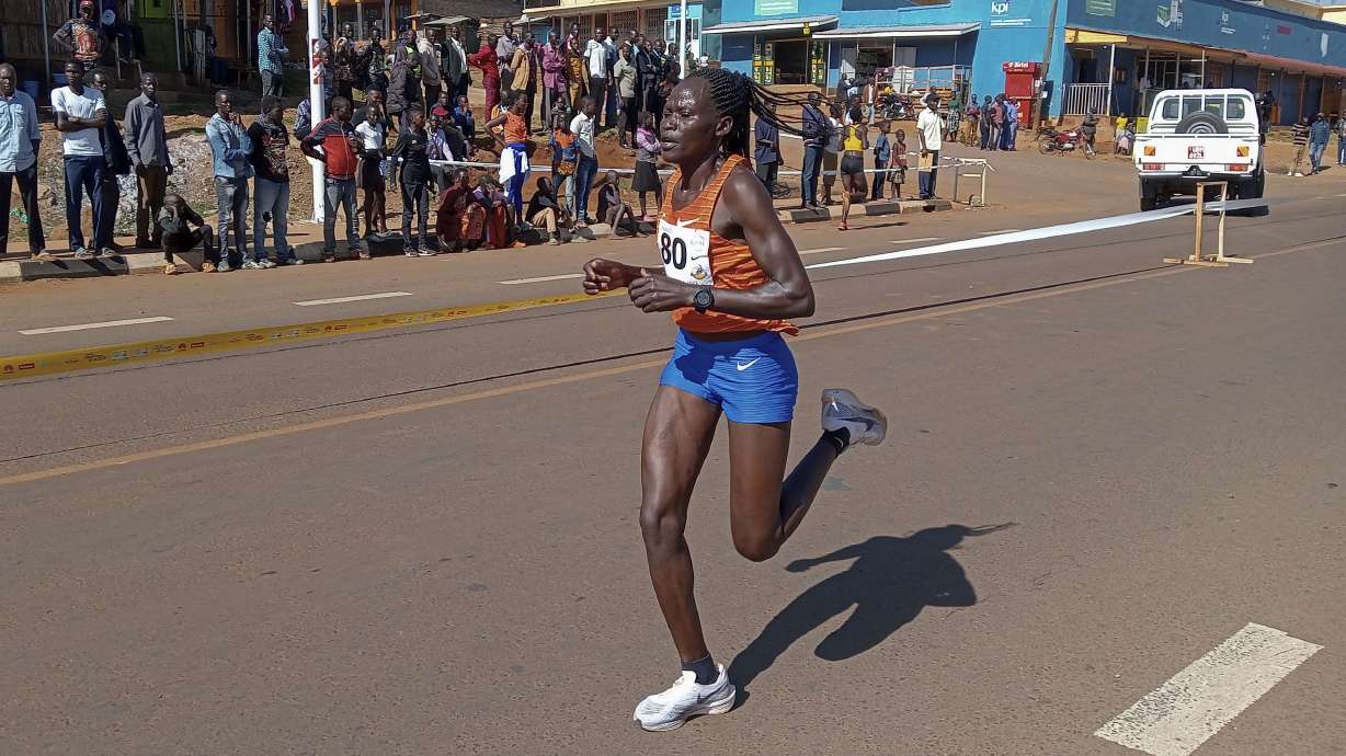 Rebecca Cheptegei, competes at the Discovery 10km road race in Kapchorwa, Uganda Friday, Jan. 20, 2023. A Cheptegei, a Ugandan athlete living in Kenya was set ablaze by her boyfriend on Sunday Sept. 1, 2024 and is currently receiving treatment for 75% burns, police said.